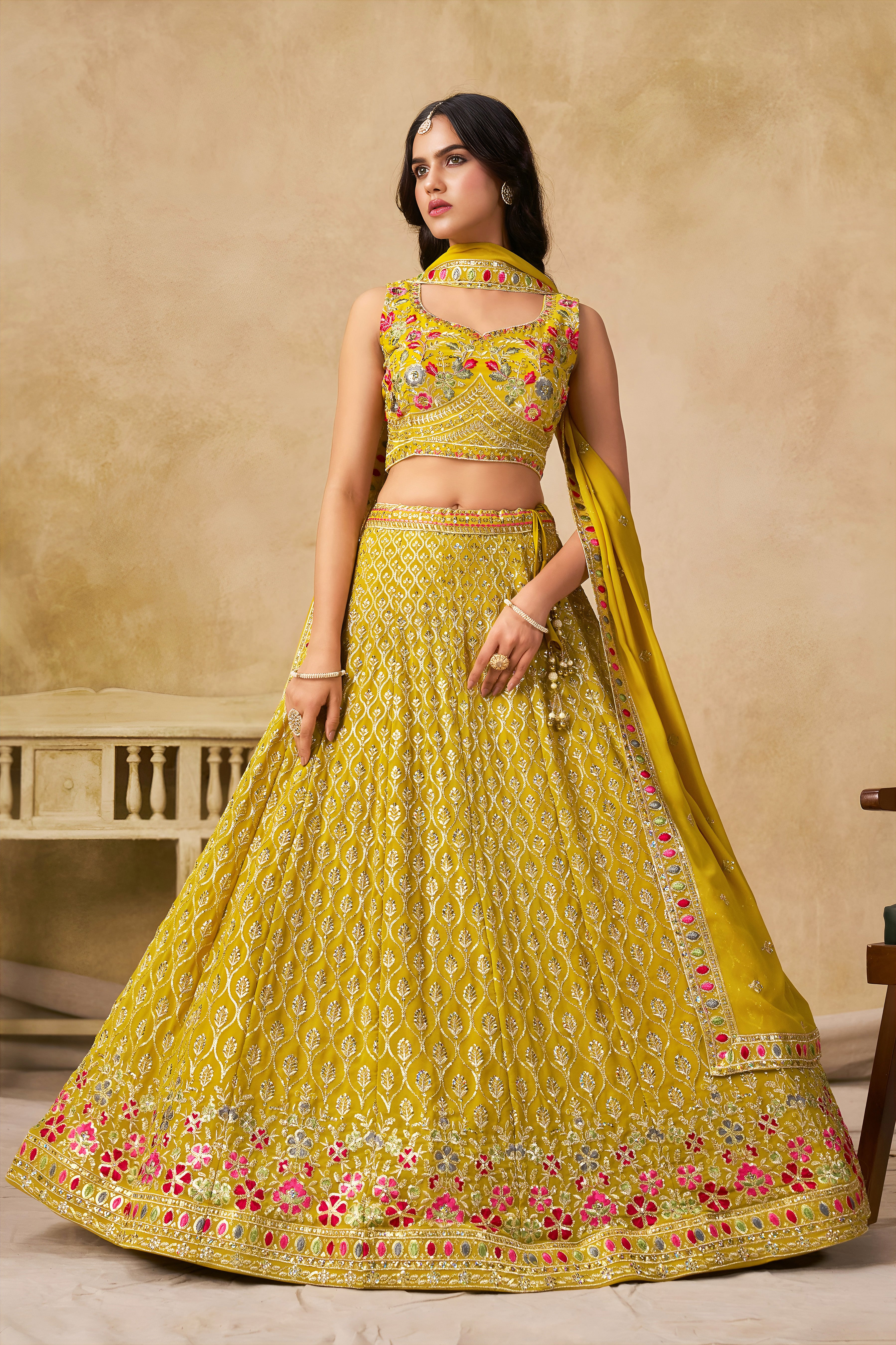 Sakhi Yellow Soft Georgette with Sequins Zari Resham and Badla Embroidery Work Lehenga Choli