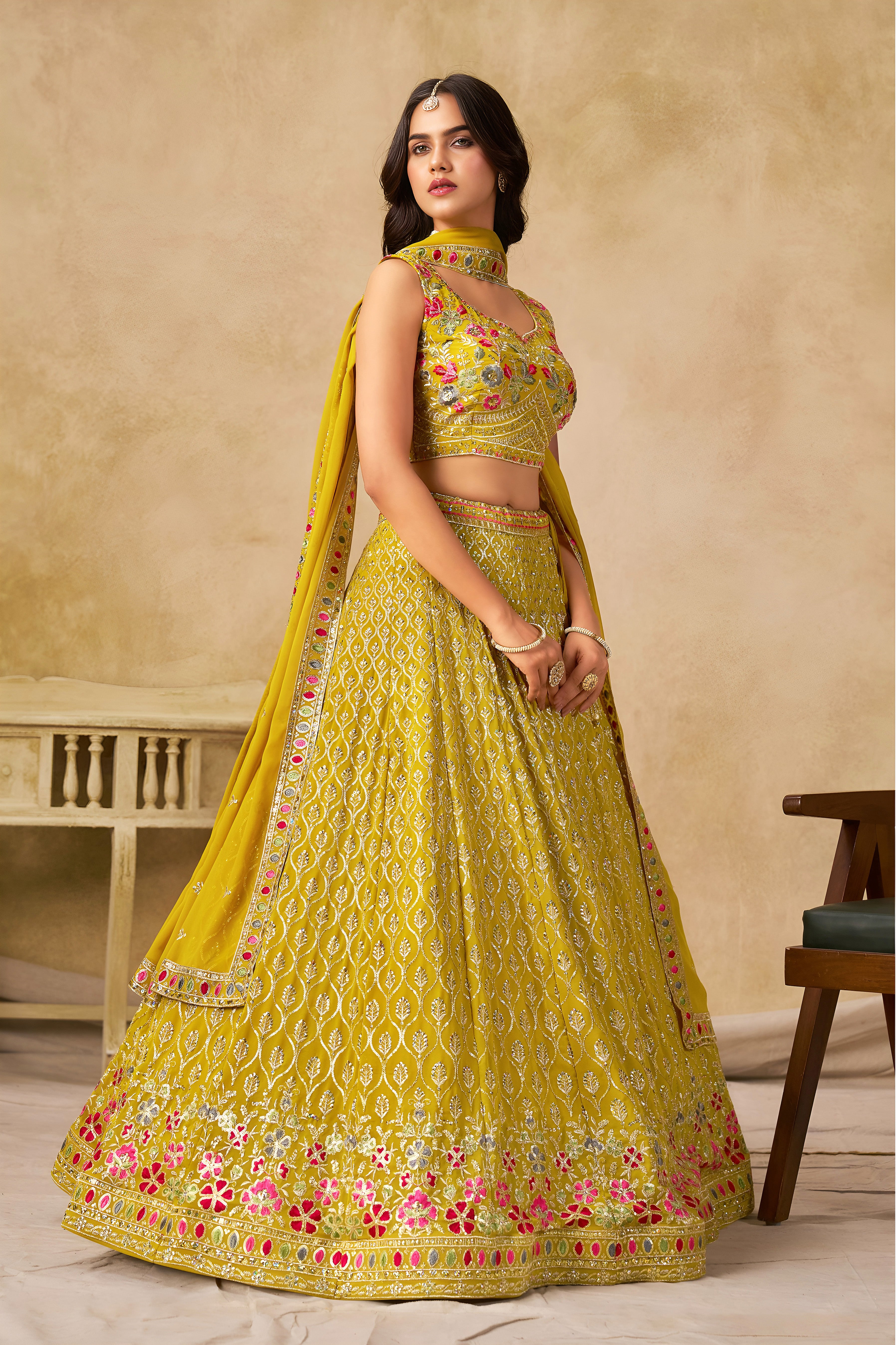 Sakhi Yellow Soft Georgette with Sequins Zari Resham and Badla Embroidery Work Lehenga Choli