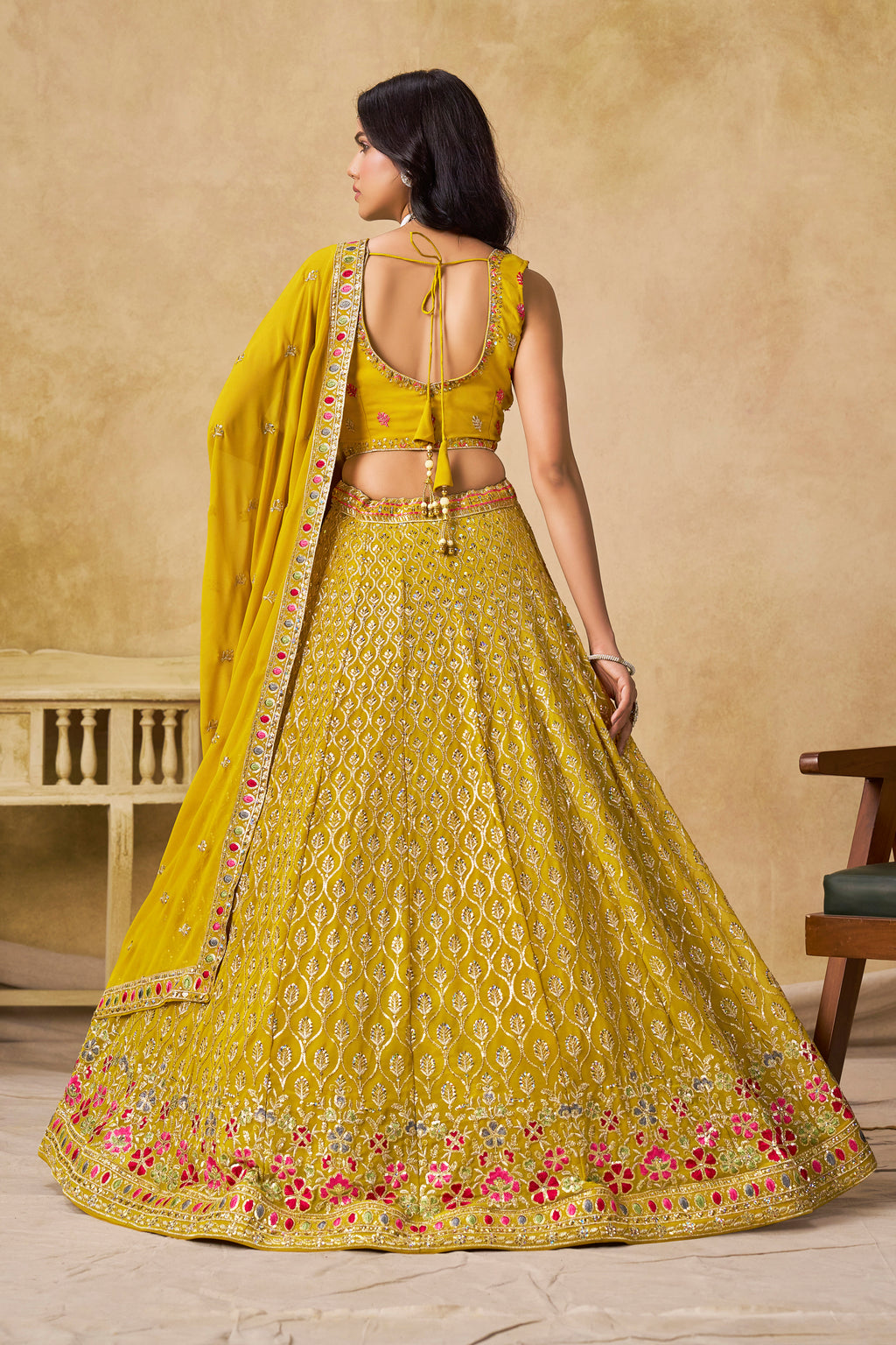 Sakhi Yellow Soft Georgette with Sequins Zari Resham and Badla Embroidery Work Lehenga Choli