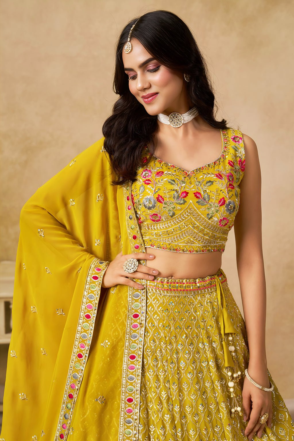 Sakhi Yellow Soft Georgette with Sequins Zari Resham and Badla Embroidery Work Lehenga Choli