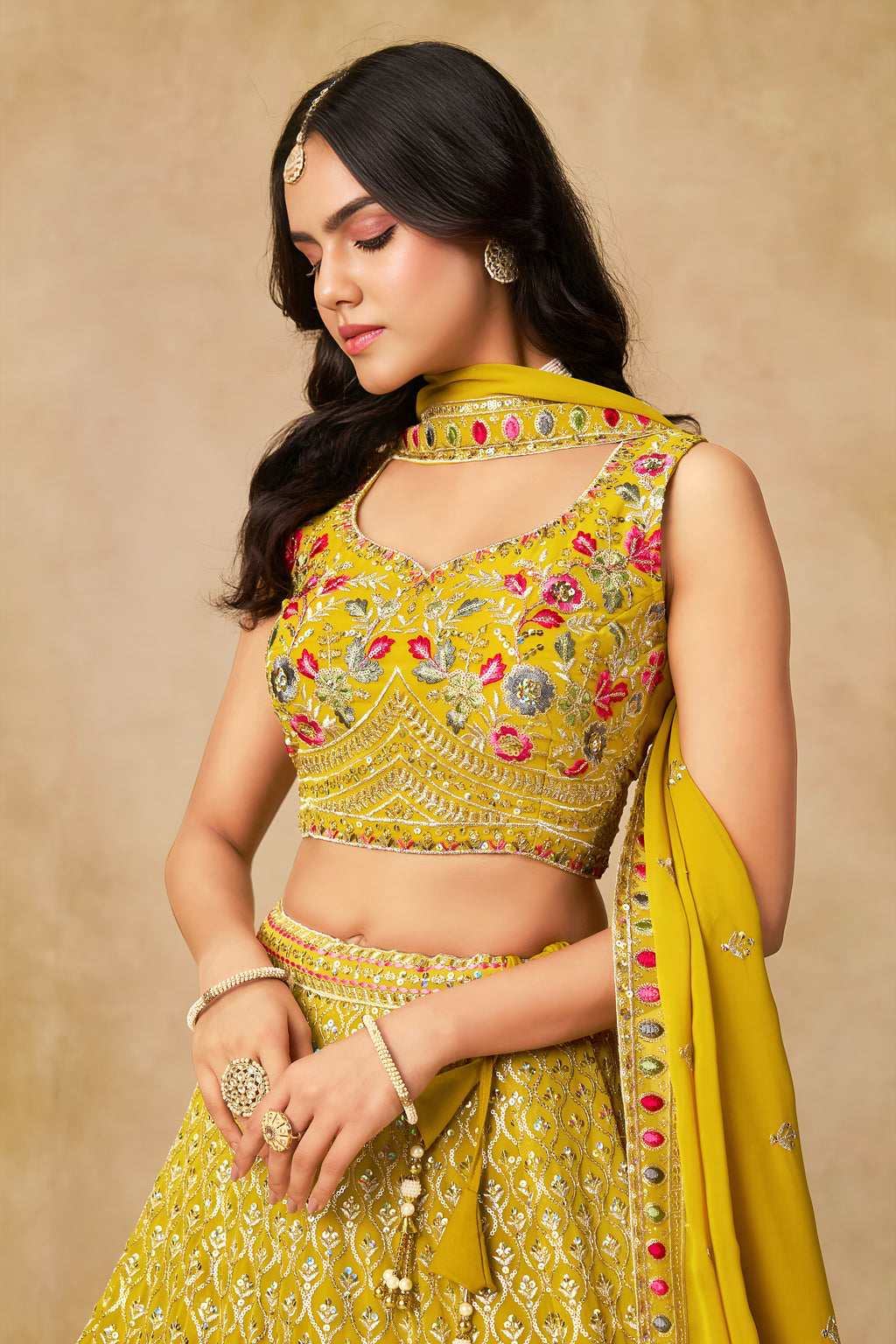Sakhi Yellow Soft Georgette with Sequins Zari Resham and Badla Embroidery Work Lehenga Choli
