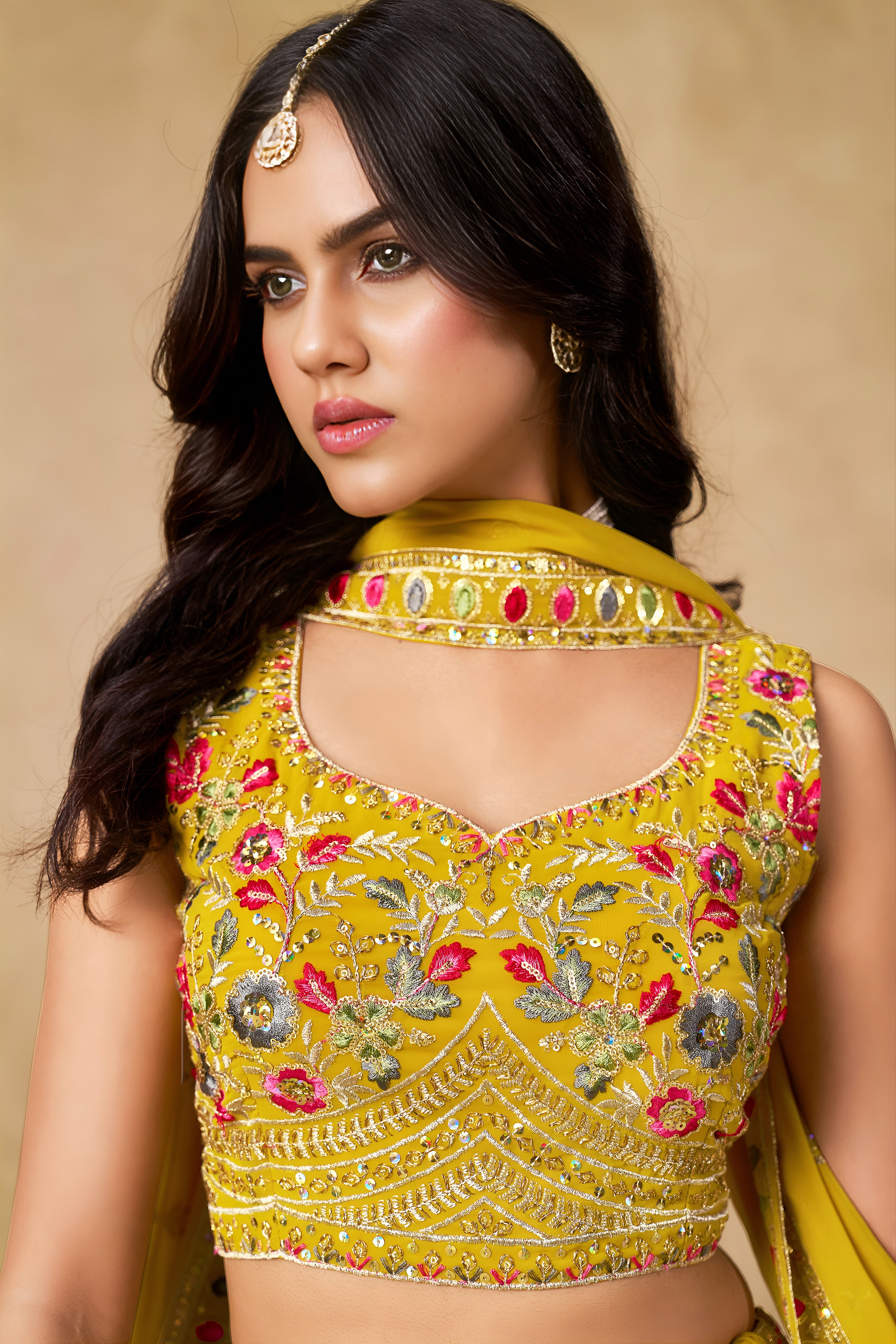 Sakhi Yellow Soft Georgette with Sequins Zari Resham and Badla Embroidery Work Lehenga Choli