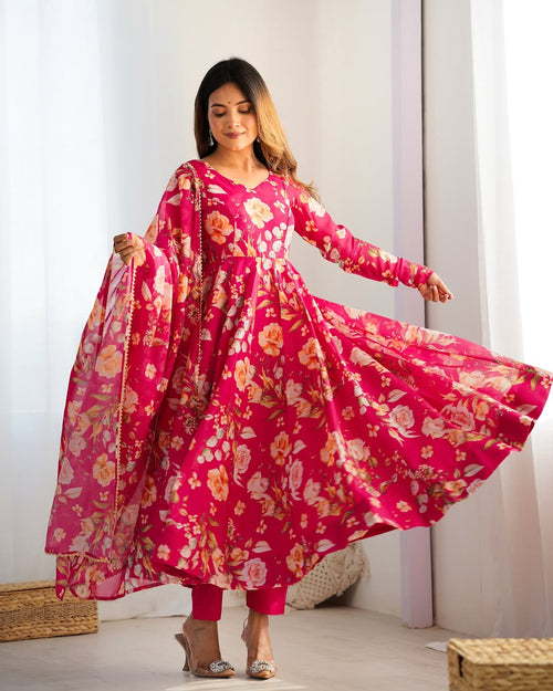 Aashvi Soft Organza Anarkali Suit Set – pastel pink fully stitched Anarkali kurta with 4-meter flair and canvas belt, paired with digitally printed micro cotton pants and a shawl-style lace border dupatta, premium soft organza festive suit for weddings, Diwali, Eid, or Raksha Bandhan, stylish and elegant ethnic set for women by Trinaari.