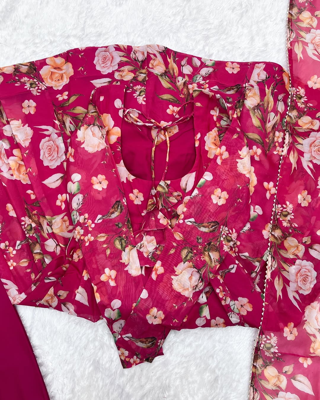 Aashvi Soft Organza Anarkali Suit Set – pastel pink fully stitched Anarkali kurta with 4-meter flair and canvas belt, paired with digitally printed micro cotton pants and a shawl-style lace border dupatta, premium soft organza festive suit for weddings, Diwali, Eid, or Raksha Bandhan, stylish and elegant ethnic set for women by Trinaari.