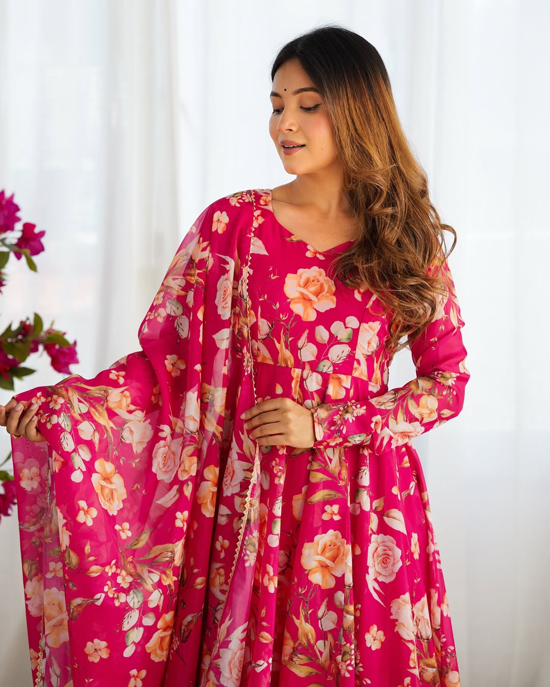 Aashvi Soft Organza Anarkali Suit Set – pastel pink fully stitched Anarkali kurta with 4-meter flair and canvas belt, paired with digitally printed micro cotton pants and a shawl-style lace border dupatta, premium soft organza festive suit for weddings, Diwali, Eid, or Raksha Bandhan, stylish and elegant ethnic set for women by Trinaari.