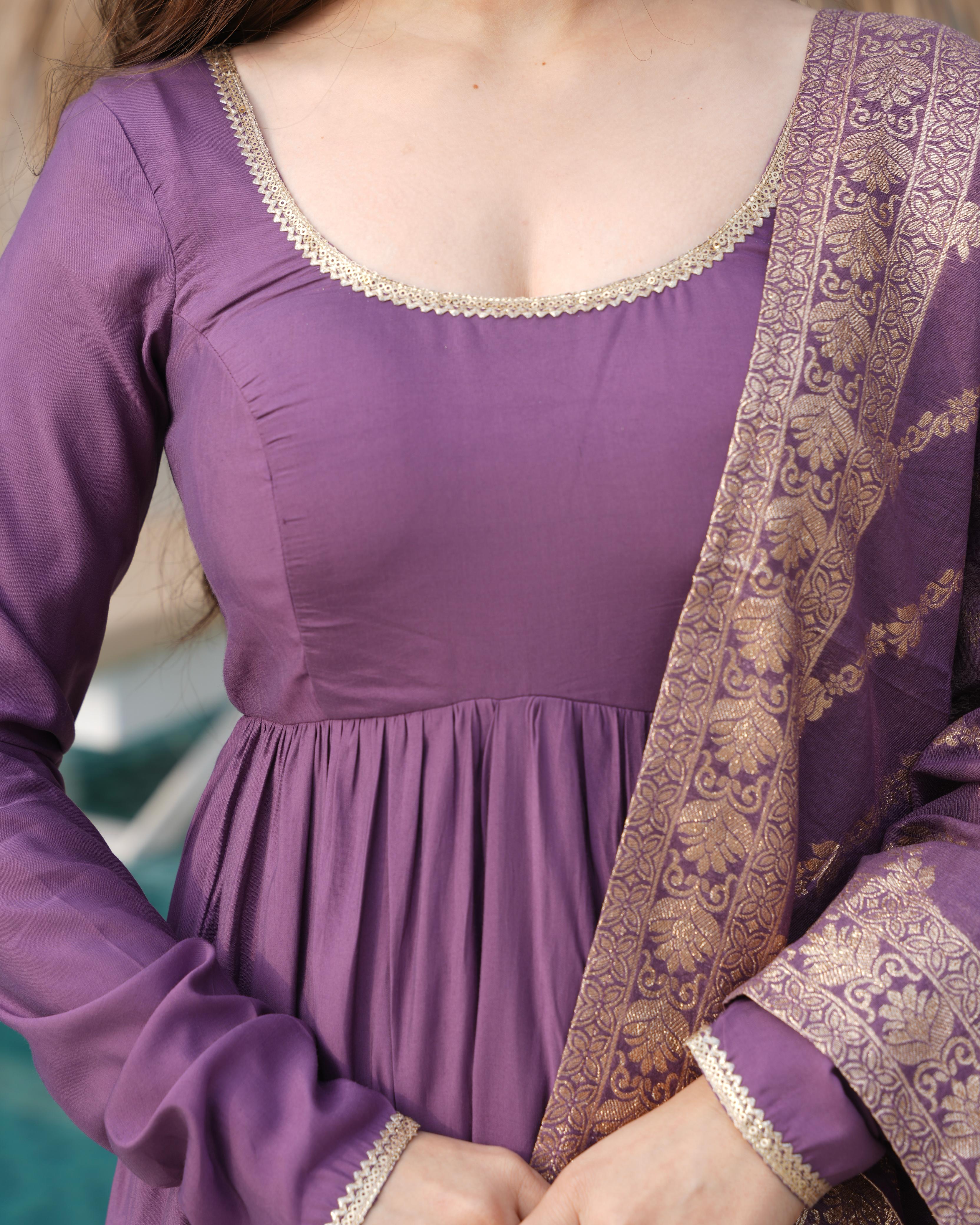 
Purple Roman silk Chanderi Anarkali suit set with Banarasi dupatta, 9-meter flair designer Anarkali gown for wedding and festive wear, Chanderi silk Anarkali with frill design, embroidered Anarkali set for haldi, sangeet, and Eid, purple ethnic wear for women, Banarasi dupatta suit set for engagement or Diwali, readymade Anarkali kurta pant set with heavy flair.