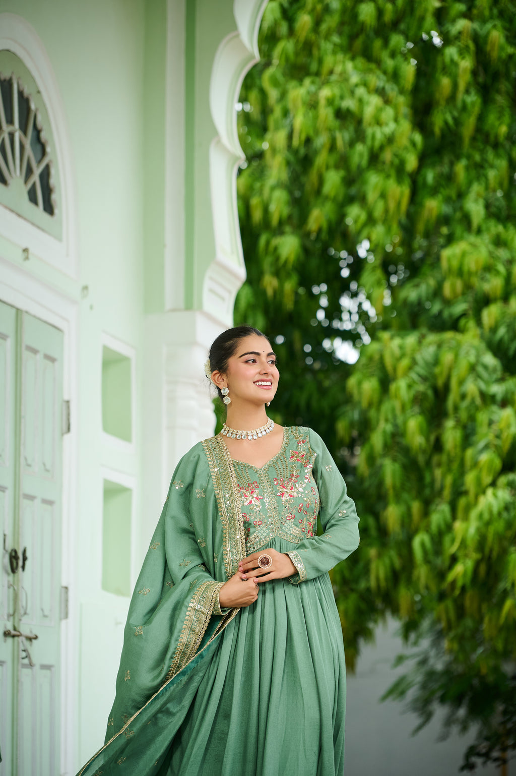 Bani pista green Vichitra silk embroidered zari thread work gown with dupatta