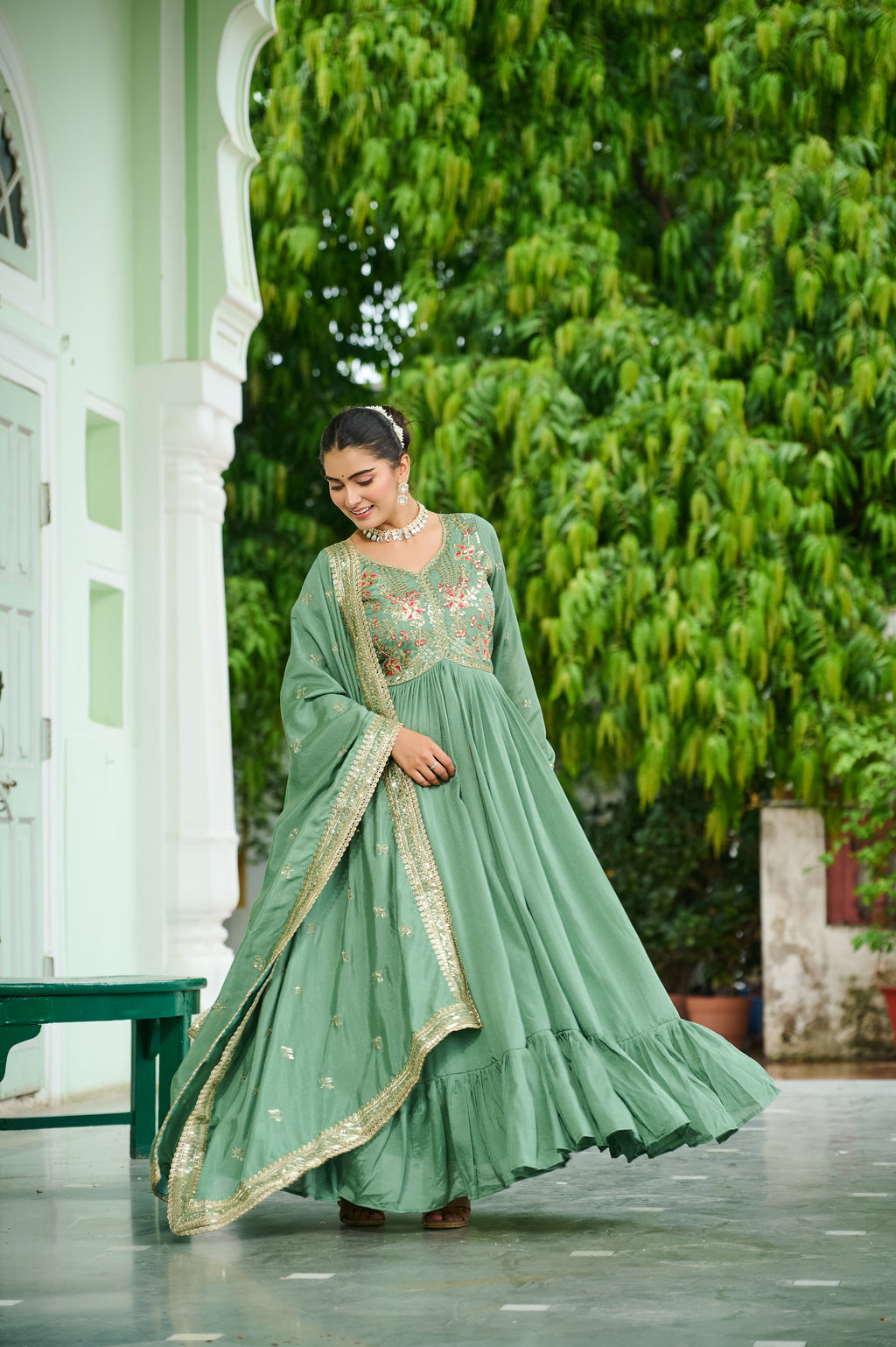 Bani pista green Vichitra silk embroidered zari thread work gown with dupatta