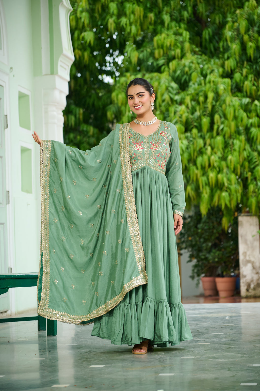 Bani pista green Vichitra silk embroidered zari thread work gown with dupatta
