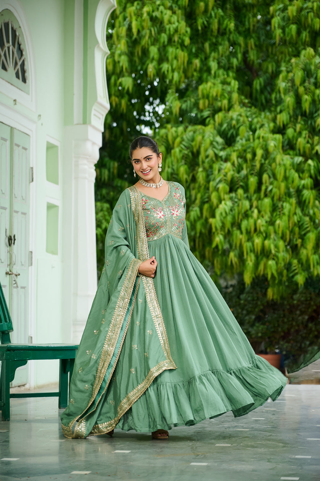 Bani pista green Vichitra silk embroidered zari thread work gown with dupatta