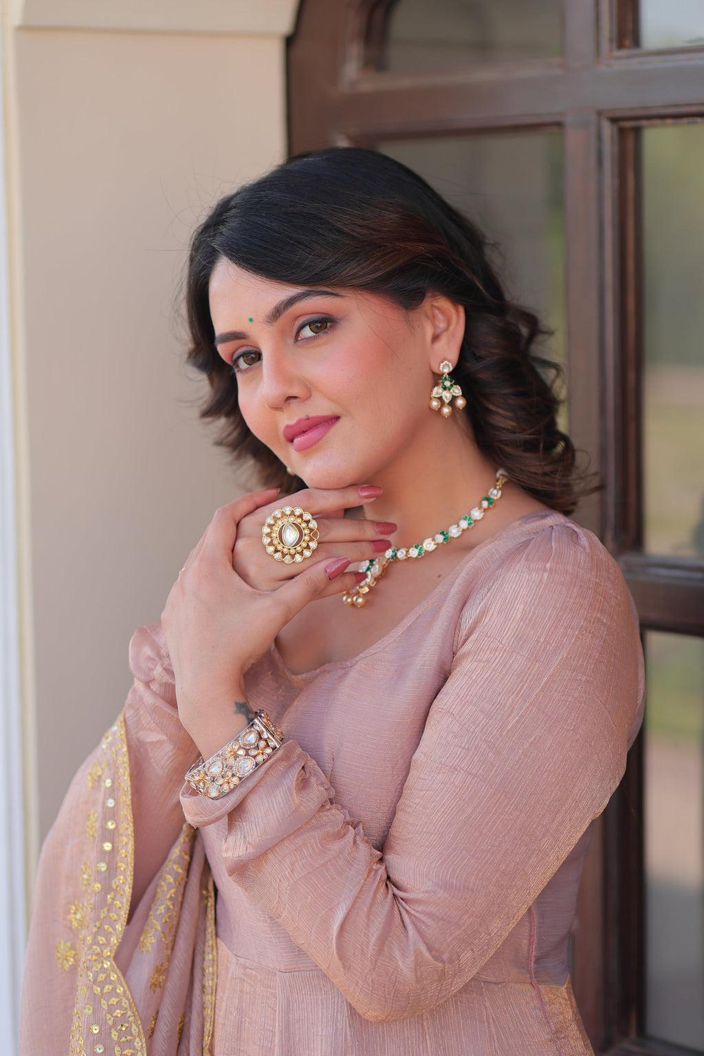 Bhargavi Peach Gown Set – Fendy chiffon gown with 12 kali stitching and 3.5 meter flair, full sleeves, cotton lining, and canvas patta; paired with a sequin and zari embroidered cut-work dupatta – perfect for weddings, sangeet, and festive celebrations.