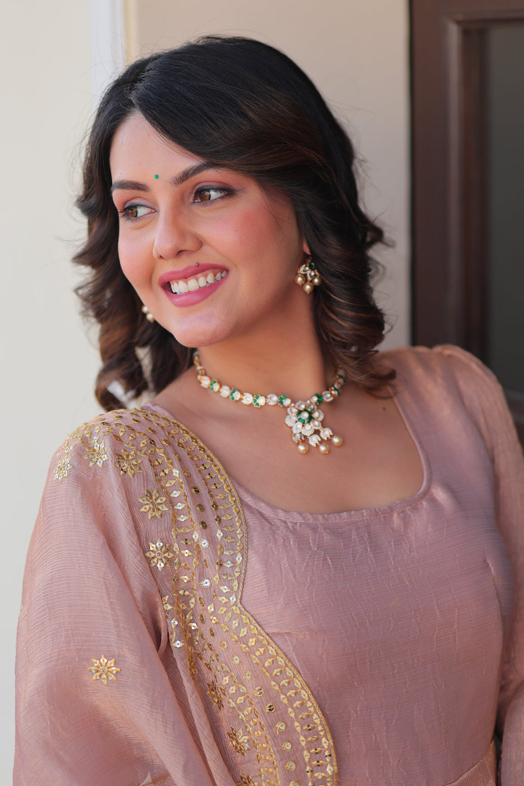 Bhargavi Peach Gown Set – Fendy chiffon gown with 12 kali stitching and 3.5 meter flair, full sleeves, cotton lining, and canvas patta; paired with a sequin and zari embroidered cut-work dupatta – perfect for weddings, sangeet, and festive celebrations.