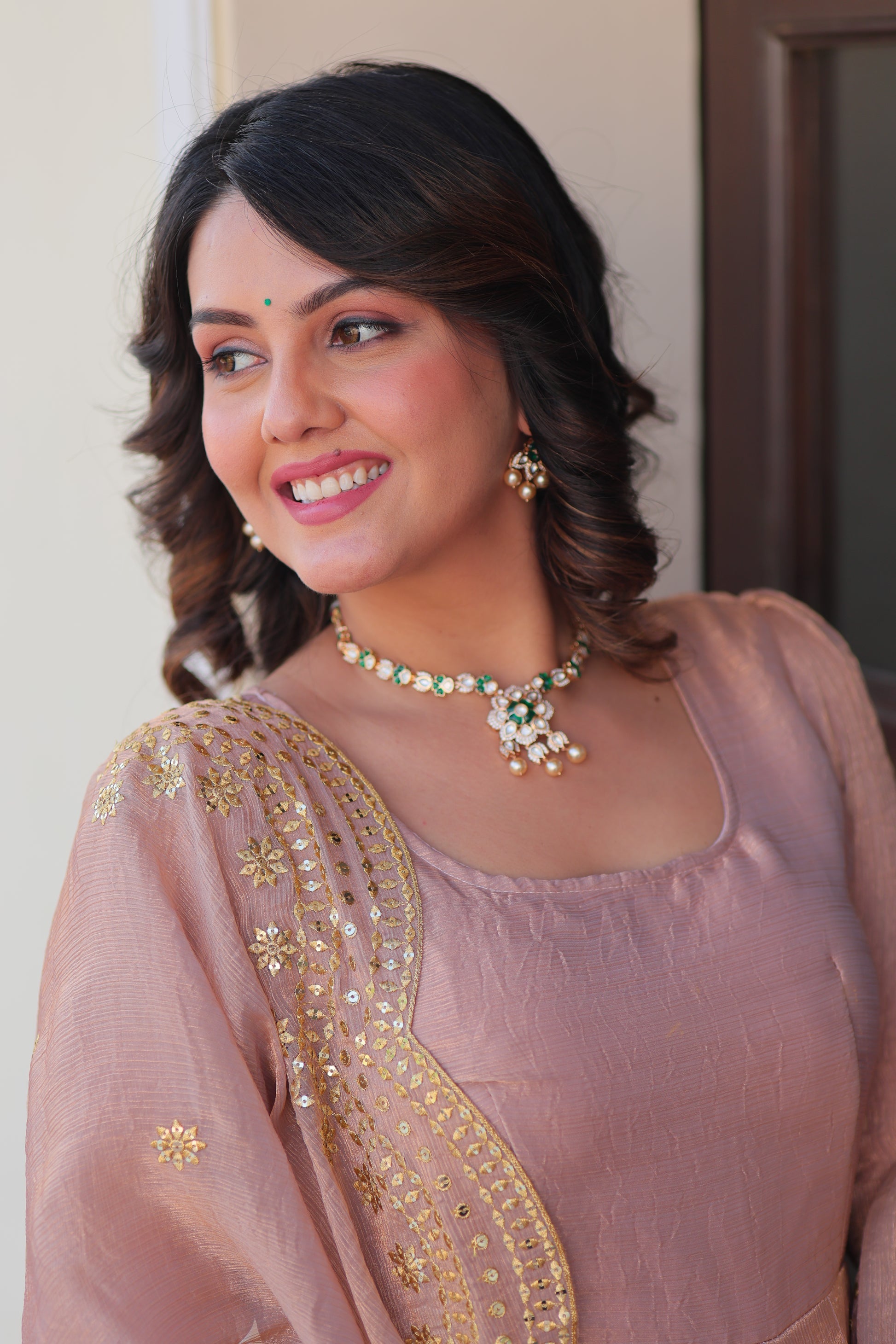 Bhargavi Peach Gown Set – Fendy chiffon gown with 12 kali stitching and 3.5 meter flair, full sleeves, cotton lining, and canvas patta; paired with a sequin and zari embroidered cut-work dupatta – perfect for weddings, sangeet, and festive celebrations.