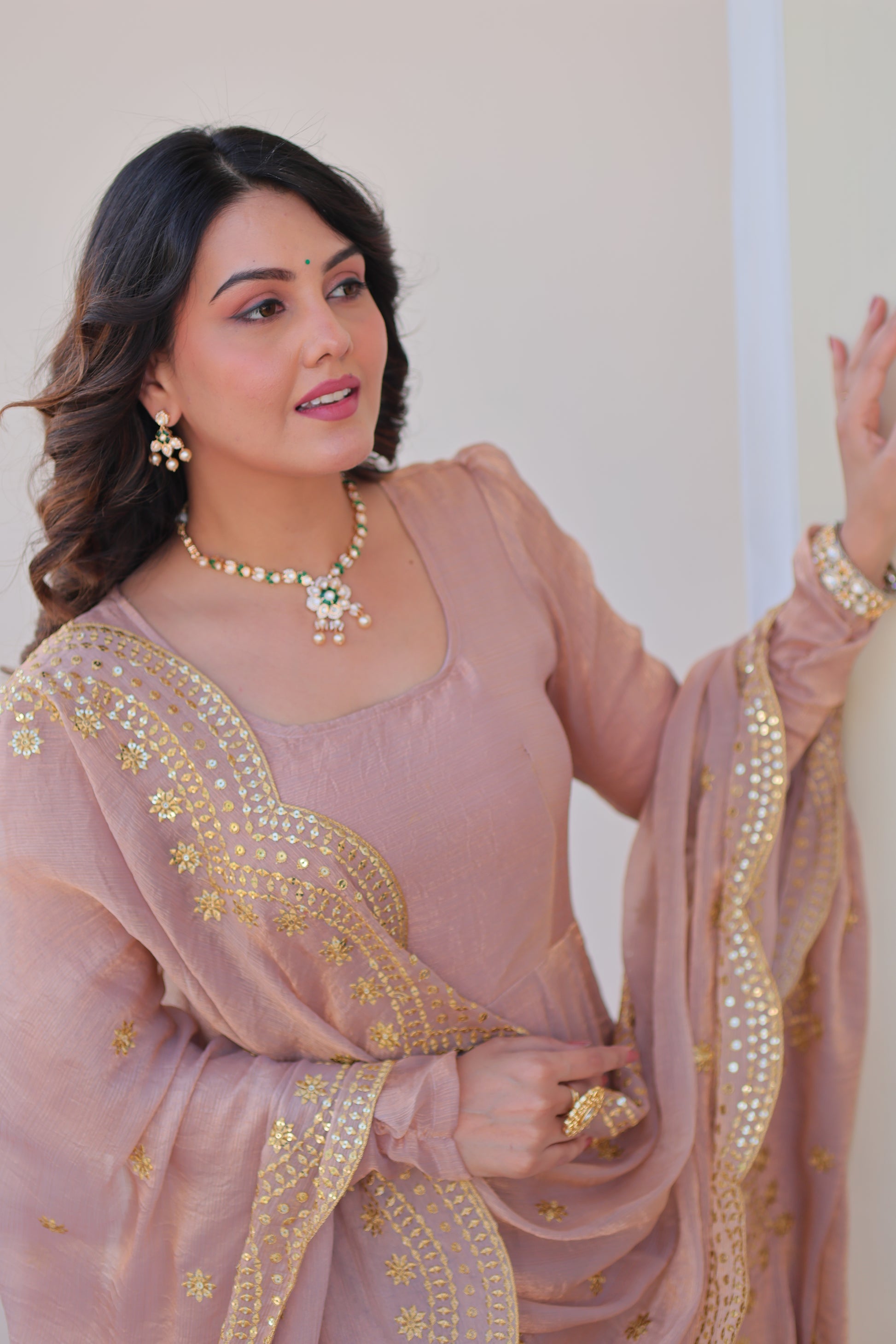 Bhargavi Peach Gown Set – Fendy chiffon gown with 12 kali stitching and 3.5 meter flair, full sleeves, cotton lining, and canvas patta; paired with a sequin and zari embroidered cut-work dupatta – perfect for weddings, sangeet, and festive celebrations.