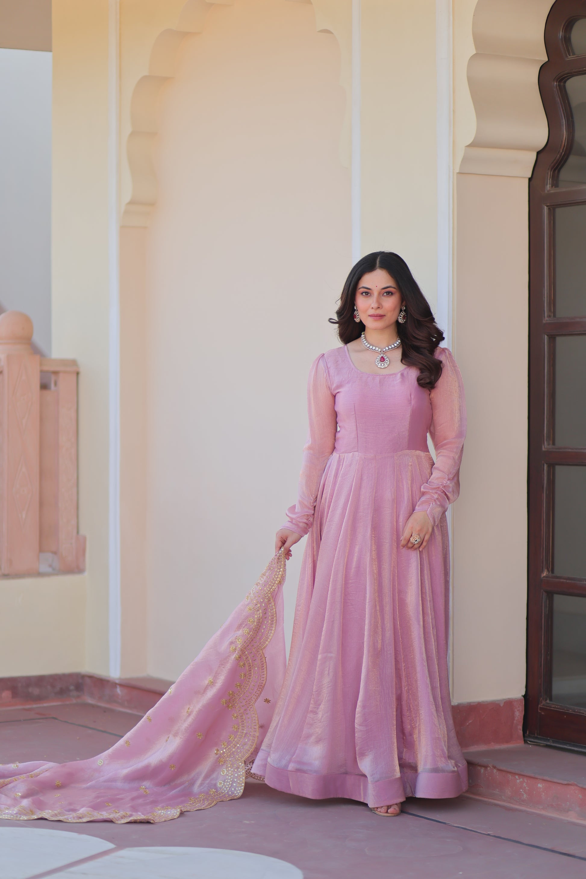 Bhargavi Pink Gown Set – Fendy chiffon gown with 12 kali stitching, full sleeves, and 3.5 meter flair; paired with a sequins and zari embroidered cut-work chiffon dupatta – ideal for weddings, sangeet, and festive occasions.