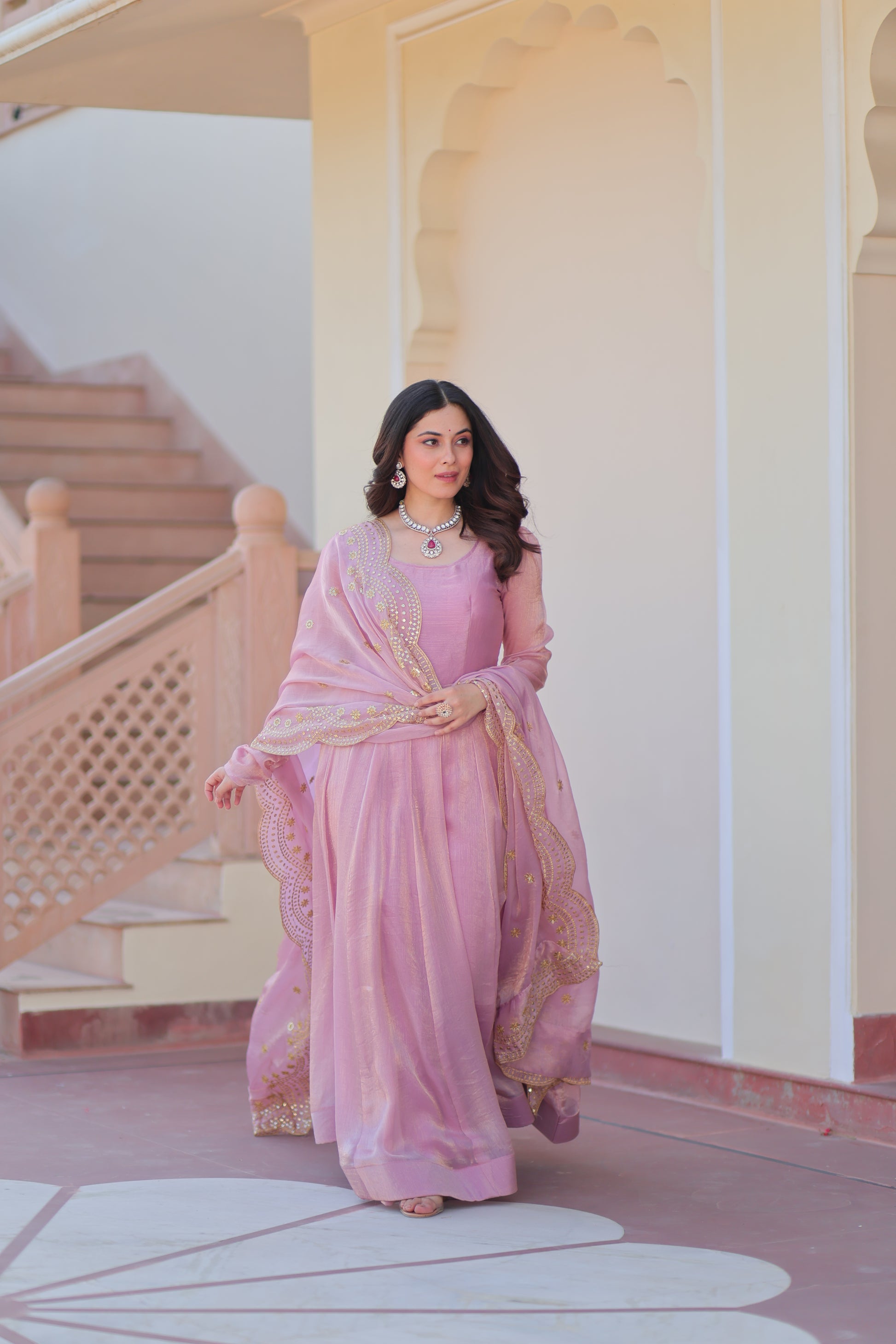 Bhargavi Pink Gown Set – Fendy chiffon gown with 12 kali stitching, full sleeves, and 3.5 meter flair; paired with a sequins and zari embroidered cut-work chiffon dupatta – ideal for weddings, sangeet, and festive occasions.