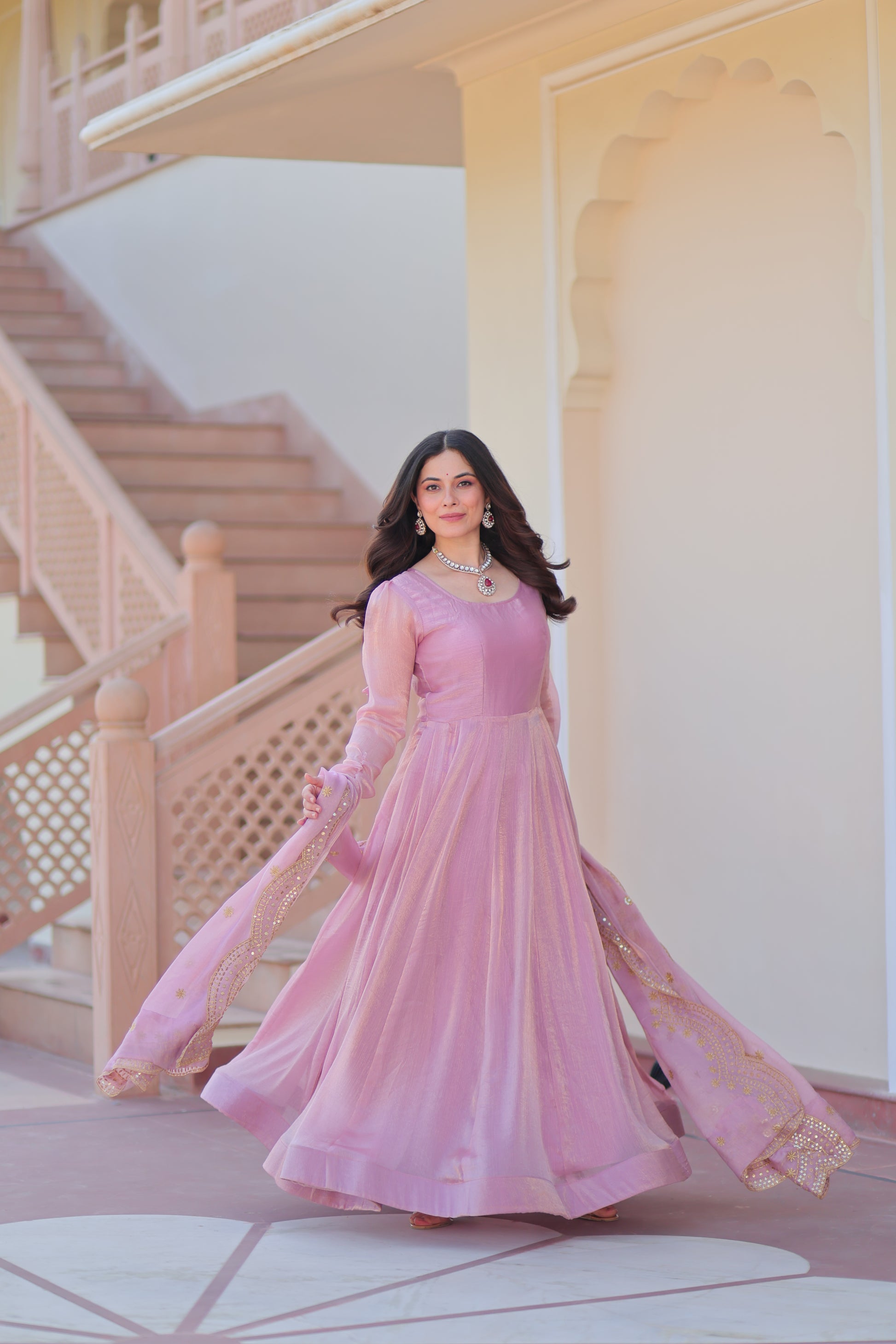 Bhargavi Pink Gown Set – Fendy chiffon gown with 12 kali stitching, full sleeves, and 3.5 meter flair; paired with a sequins and zari embroidered cut-work chiffon dupatta – ideal for weddings, sangeet, and festive occasions.
