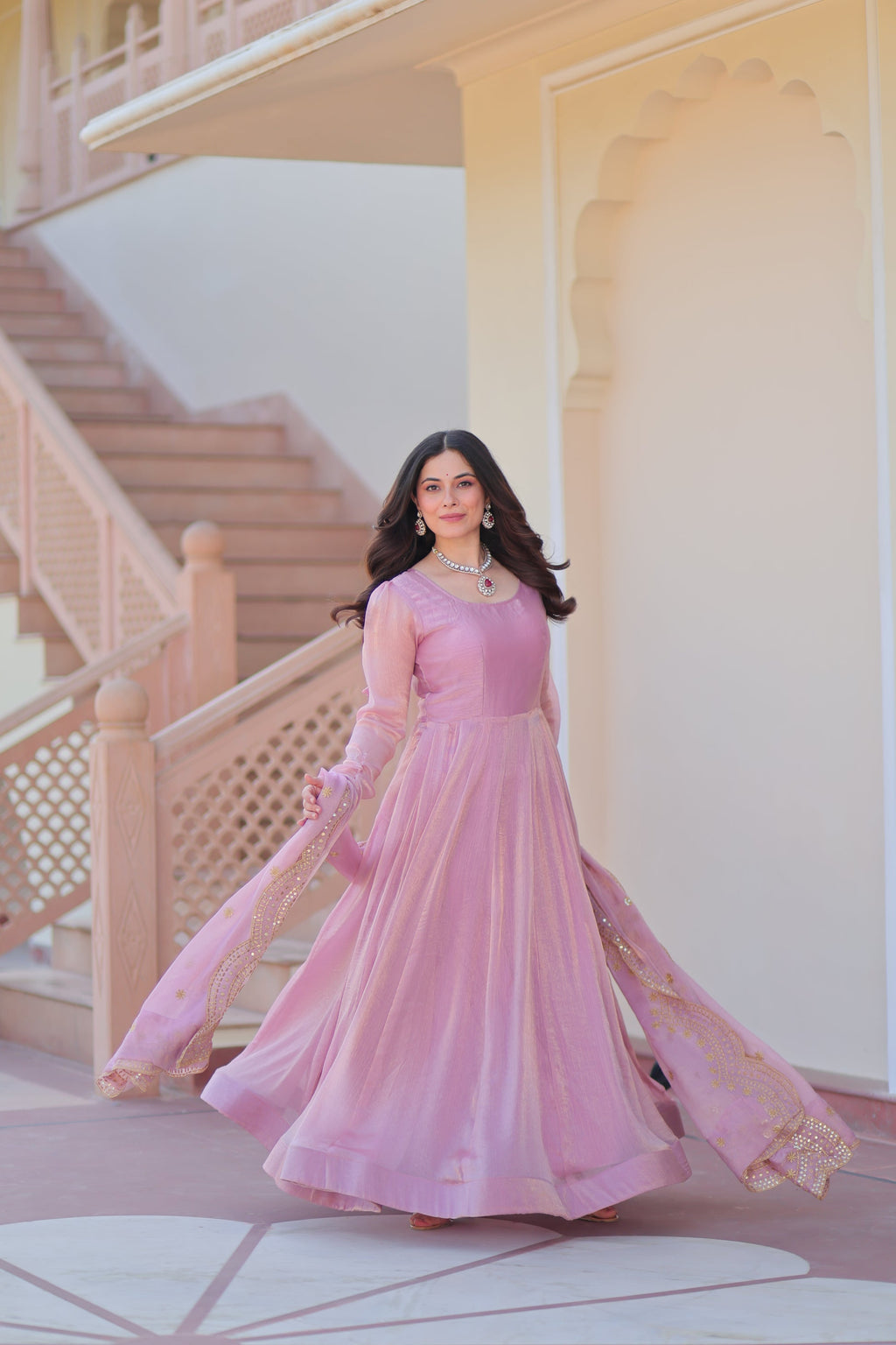 Bhargavi Pink Gown Set – Fendy chiffon gown with 12 kali stitching, full sleeves, and 3.5 meter flair; paired with a sequins and zari embroidered cut-work chiffon dupatta – ideal for weddings, sangeet, and festive occasions.