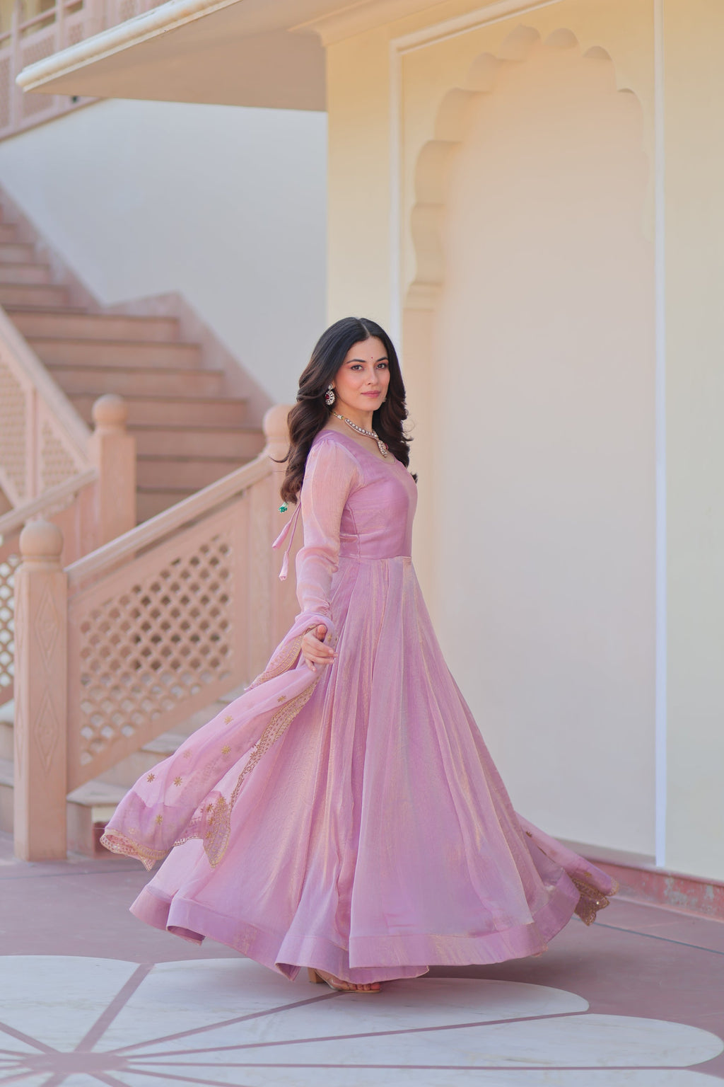 Bhargavi Pink Gown Set – Fendy chiffon gown with 12 kali stitching, full sleeves, and 3.5 meter flair; paired with a sequins and zari embroidered cut-work chiffon dupatta – ideal for weddings, sangeet, and festive occasions.