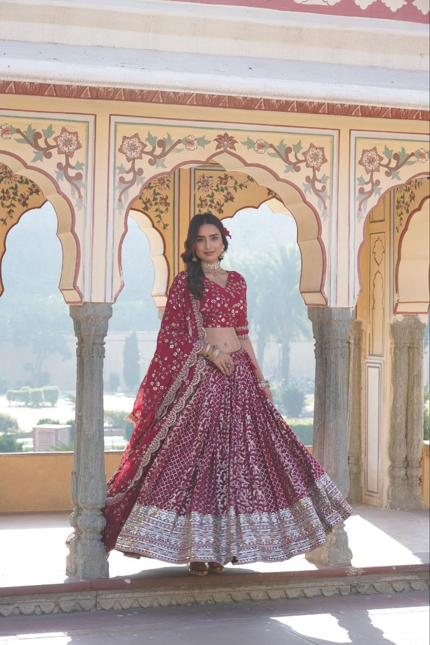 Kaushiki red embroidered lehenga set