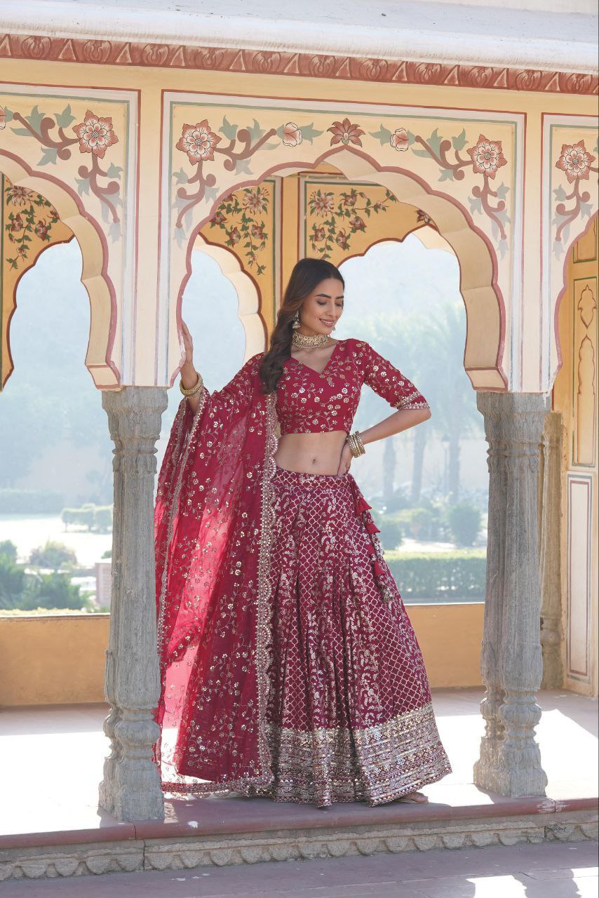 Kaushiki red embroidered lehenga set
