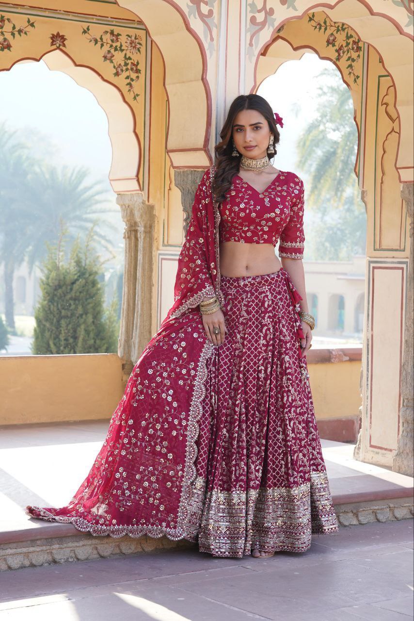Kaushiki red embroidered lehenga set