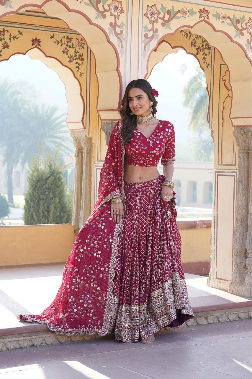 Kaushiki red embroidered lehenga set