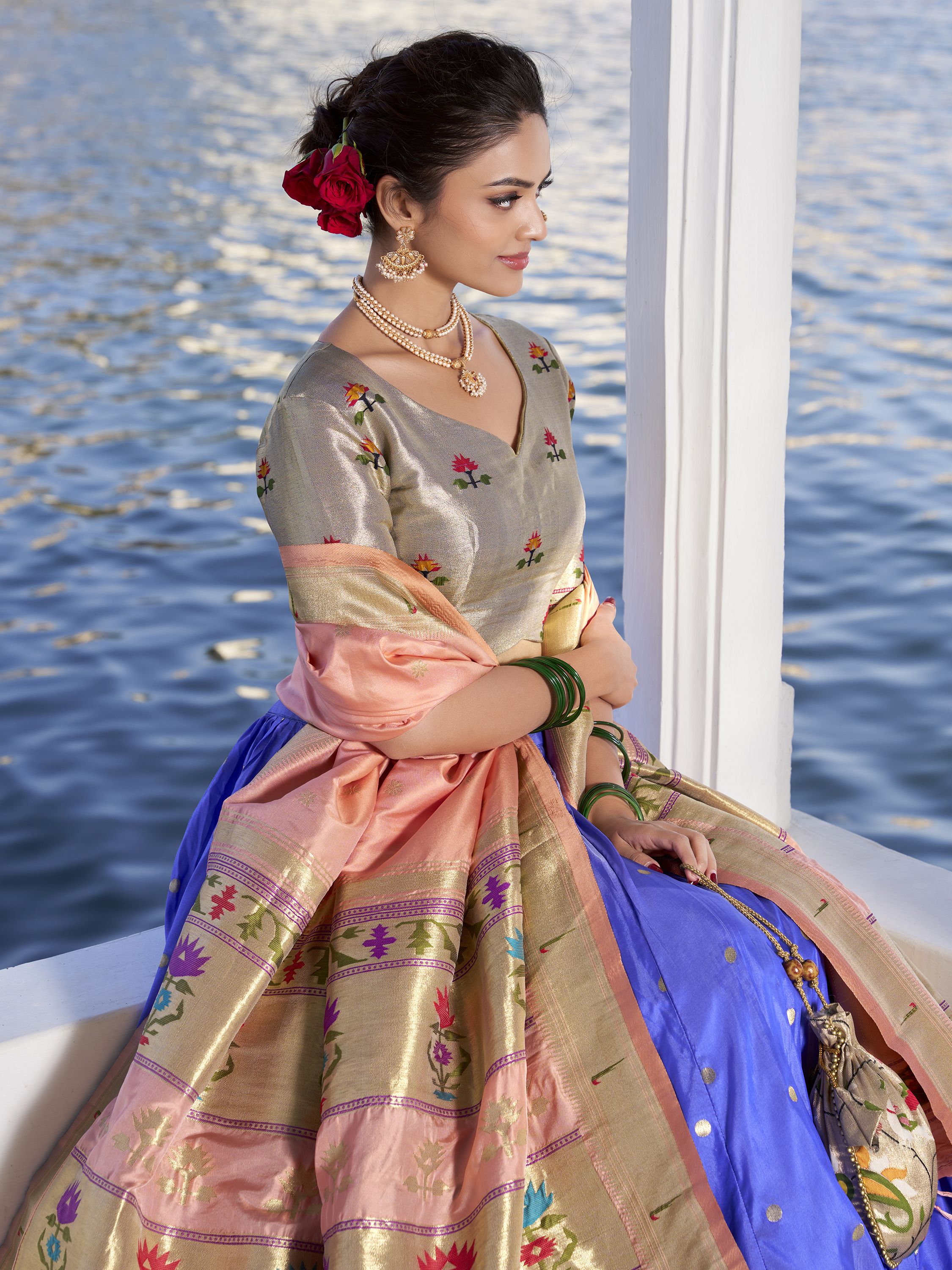 Blue Jacquard Silk Paithani Lehenga Choli with zari weaving, lace accents, tassel dupatta, and matching batwa – traditional Maharashtrian festive attire