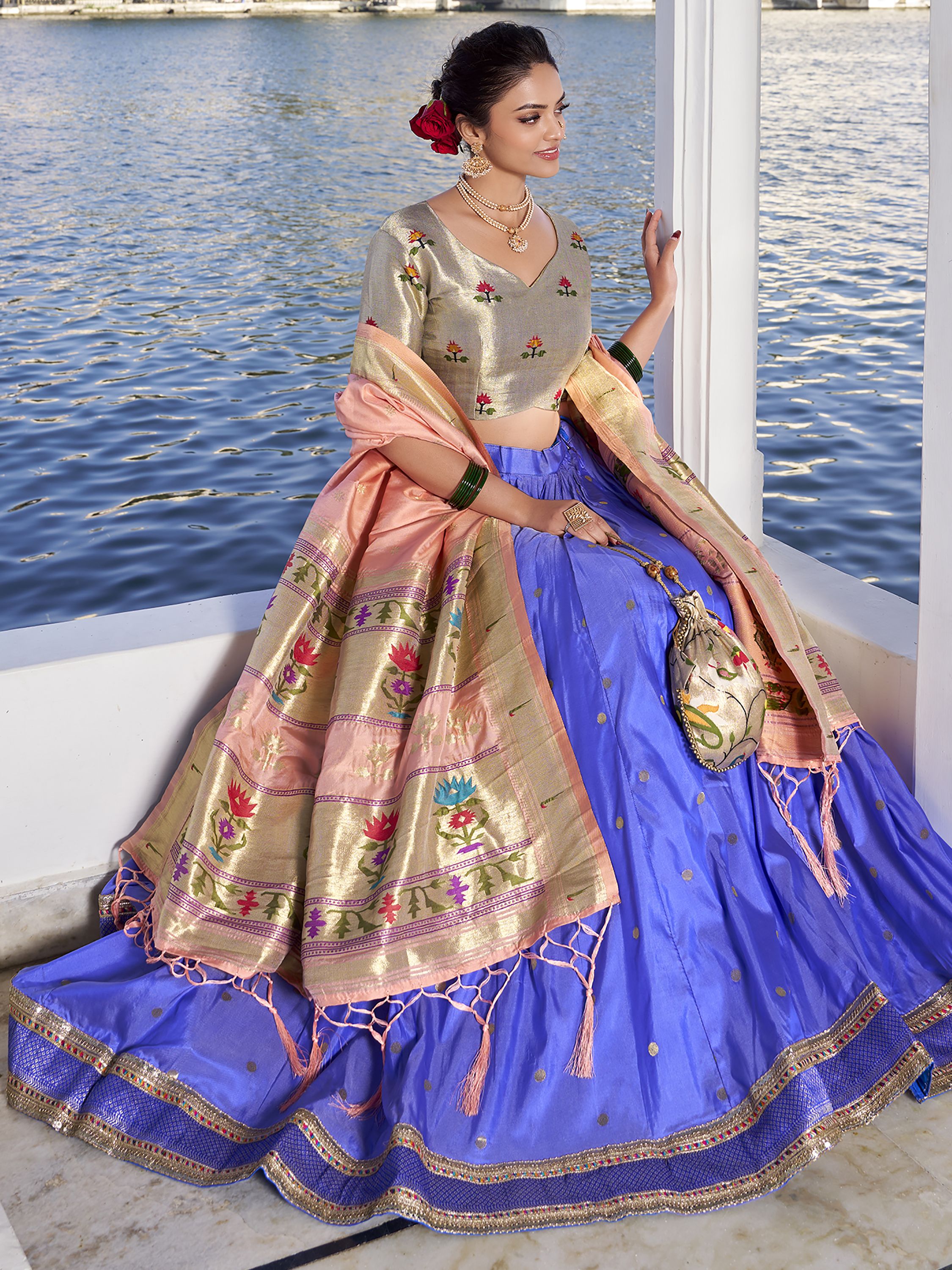 Blue Jacquard Silk Paithani Lehenga Choli with zari weaving, lace accents, tassel dupatta, and matching batwa – traditional Maharashtrian festive attire