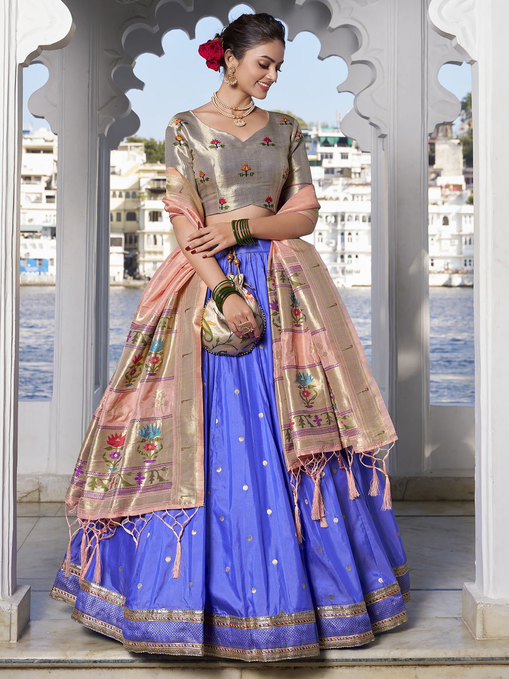 Blue Jacquard Silk Paithani Lehenga Choli with zari weaving, lace accents, tassel dupatta, and matching batwa – traditional Maharashtrian festive attire