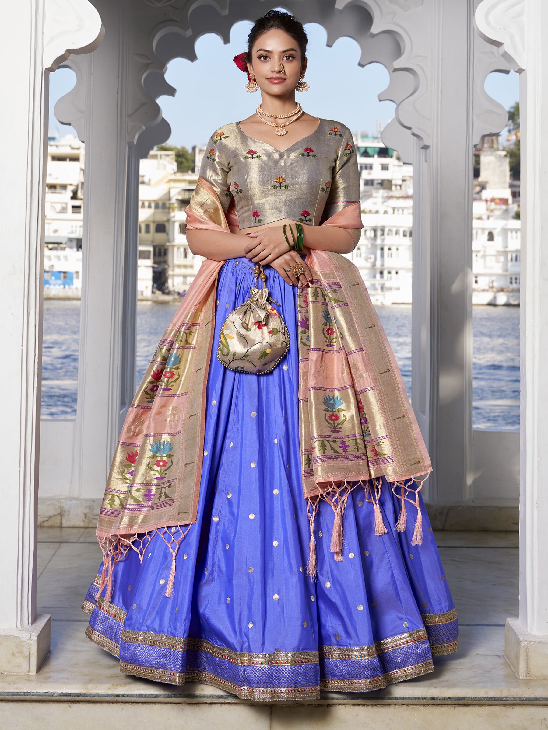 Blue Jacquard Silk Paithani Lehenga Choli with zari weaving, lace accents, tassel dupatta, and matching batwa – traditional Maharashtrian festive attire