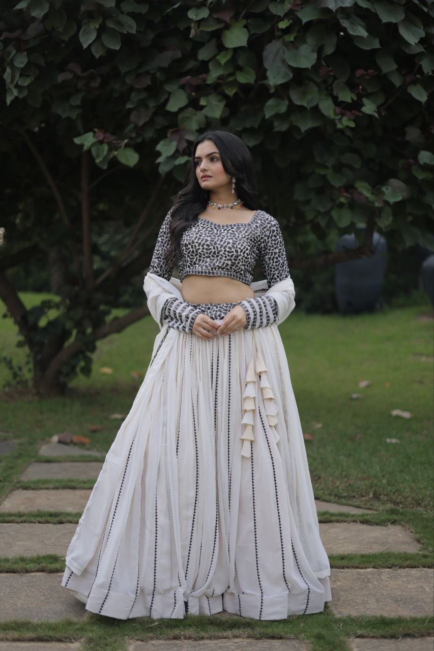Cream coloured georgette sequins designer party lehenga