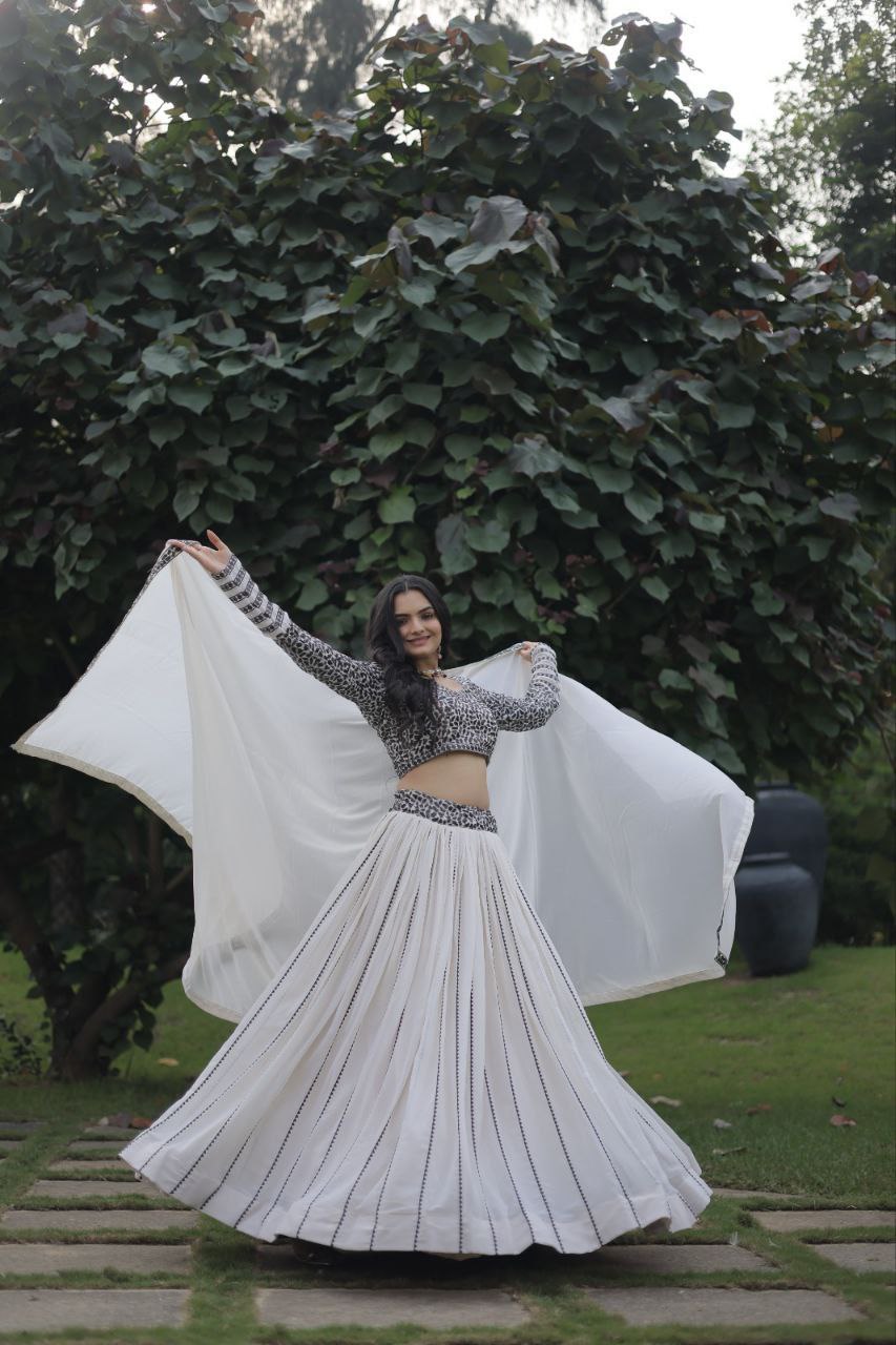 Cream coloured georgette sequins designer party lehenga