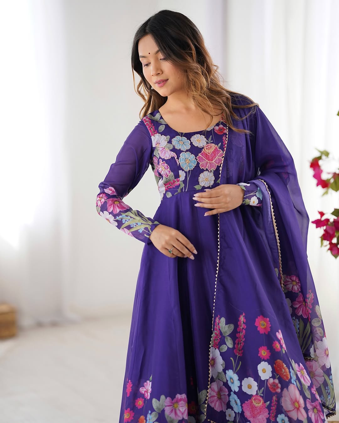  Darshika purple organza silk floral printed Anarkali suit set featuring zari work and Gota Patti lace border on the dupatta, paired with micro cotton pants – perfect for weddings, festivals, and luxury Indian ethnic wear in 2025.
