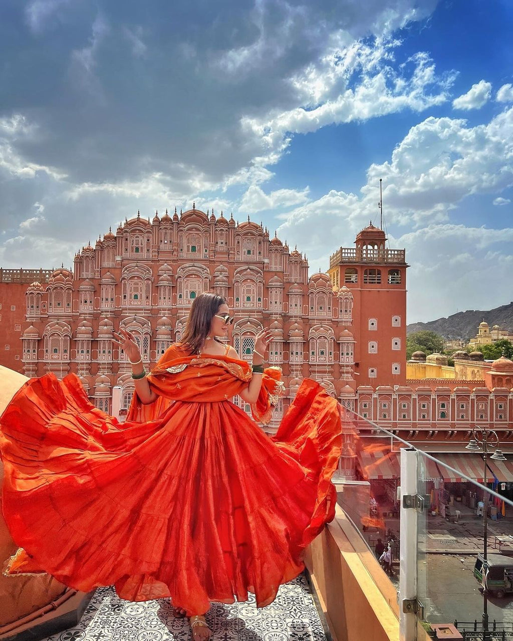 Devayani orange georgette anarkali gown set