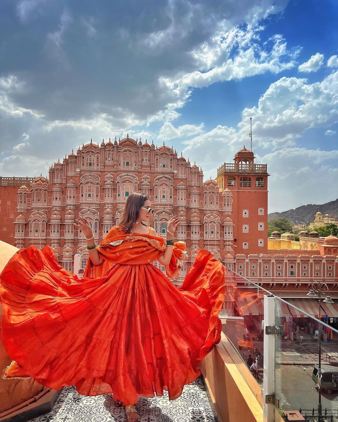 Devayani orange georgette anarkali gown set