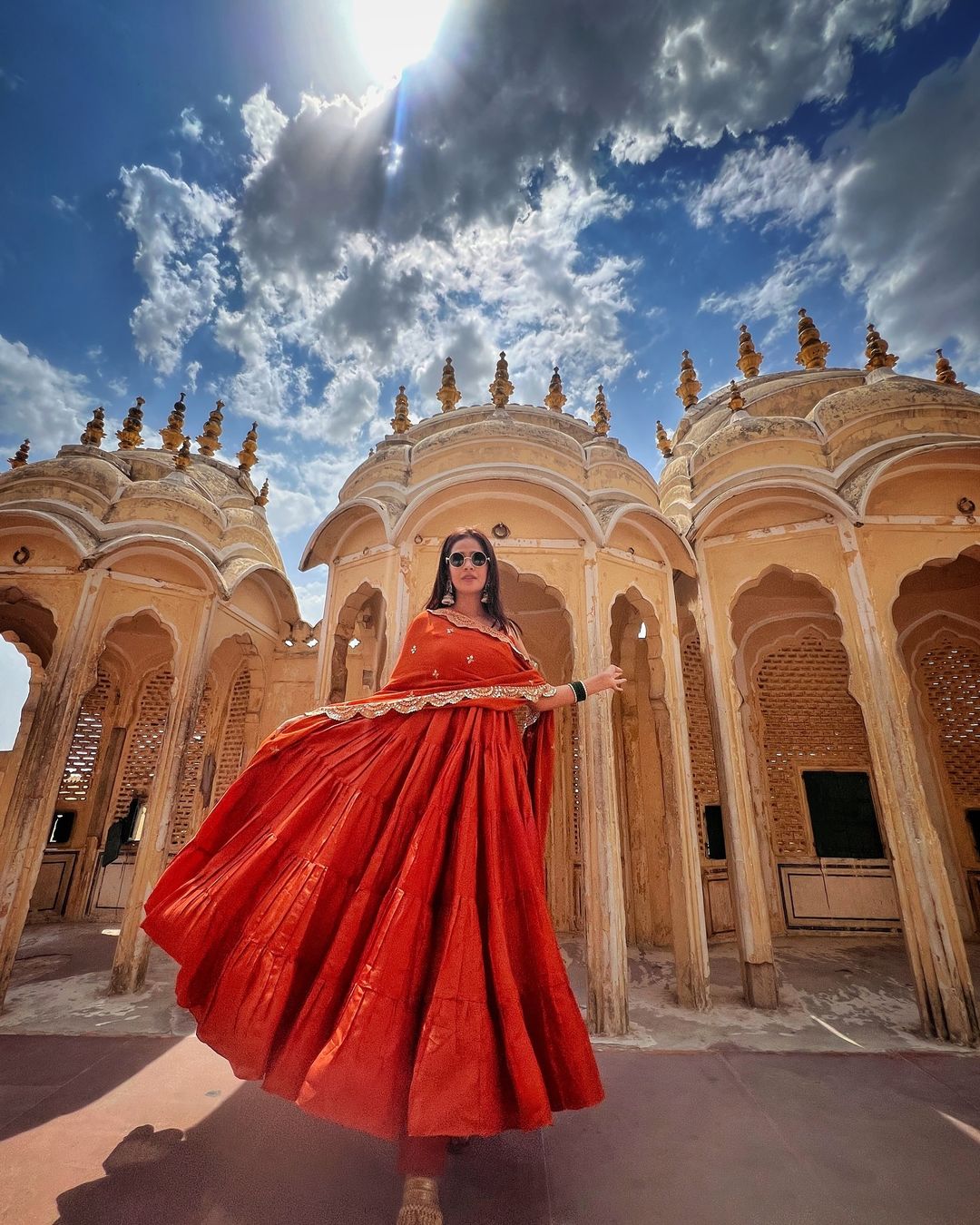 Devayani orange georgette anarkali gown set