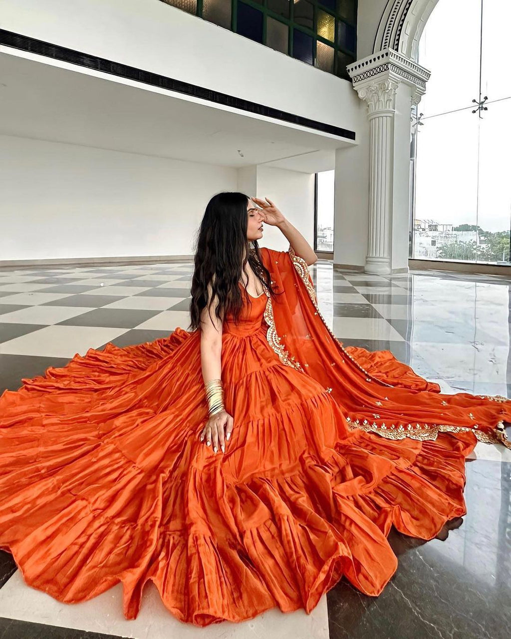 Devayani orange georgette anarkali gown set