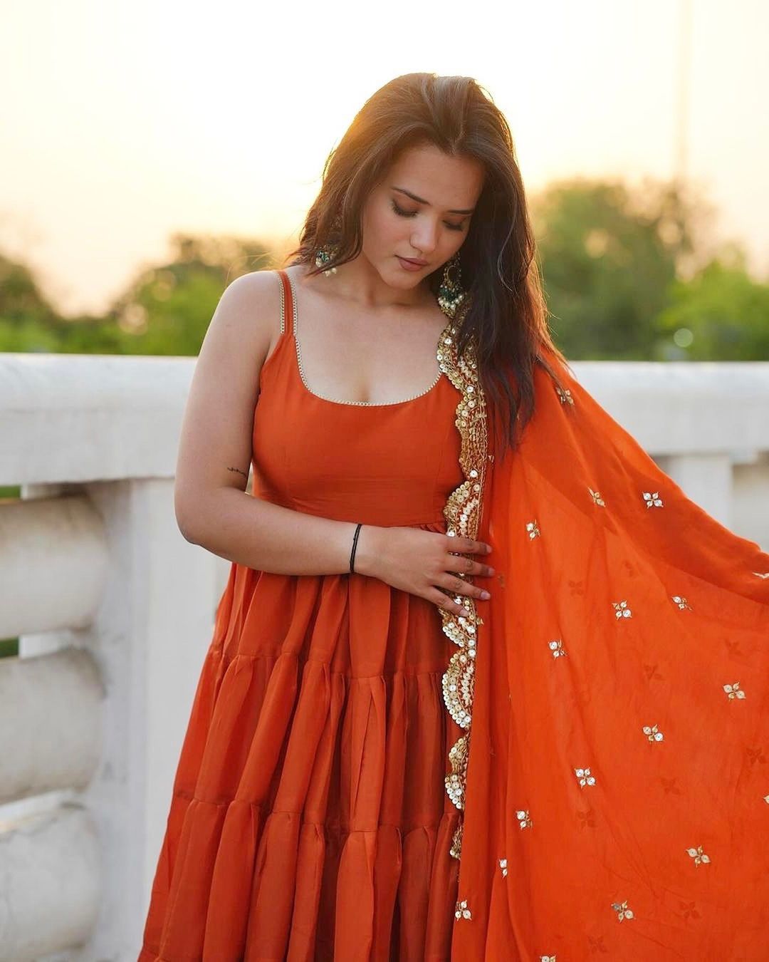Devayani orange georgette anarkali gown set