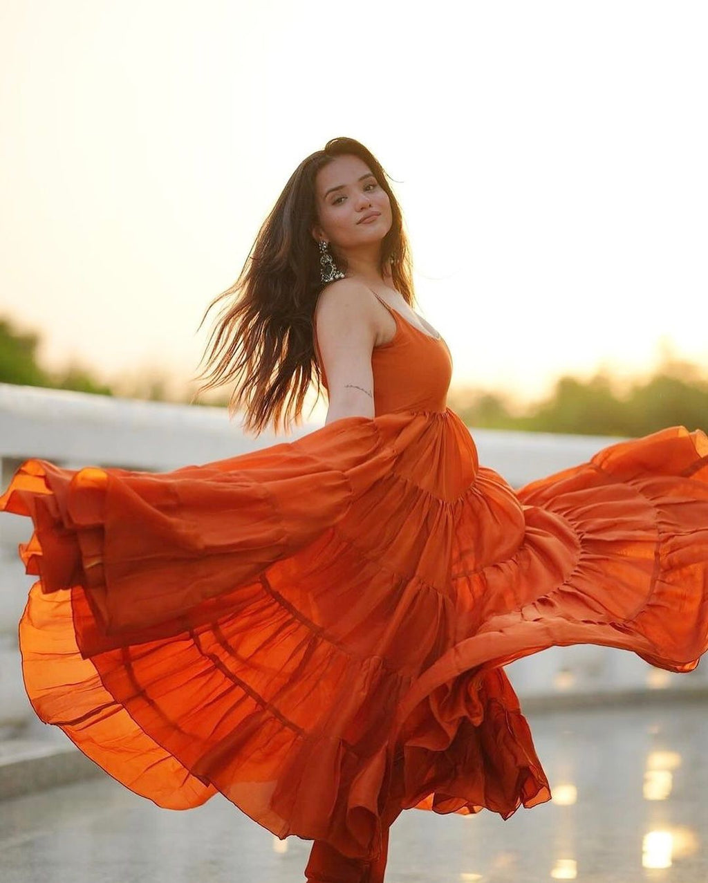 Devayani orange georgette anarkali gown set