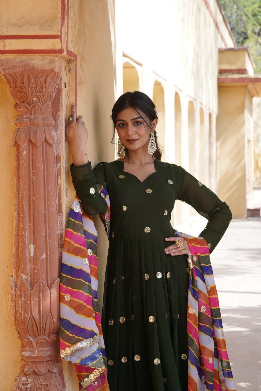 Dhumavati green georgette anarkali gown suit set