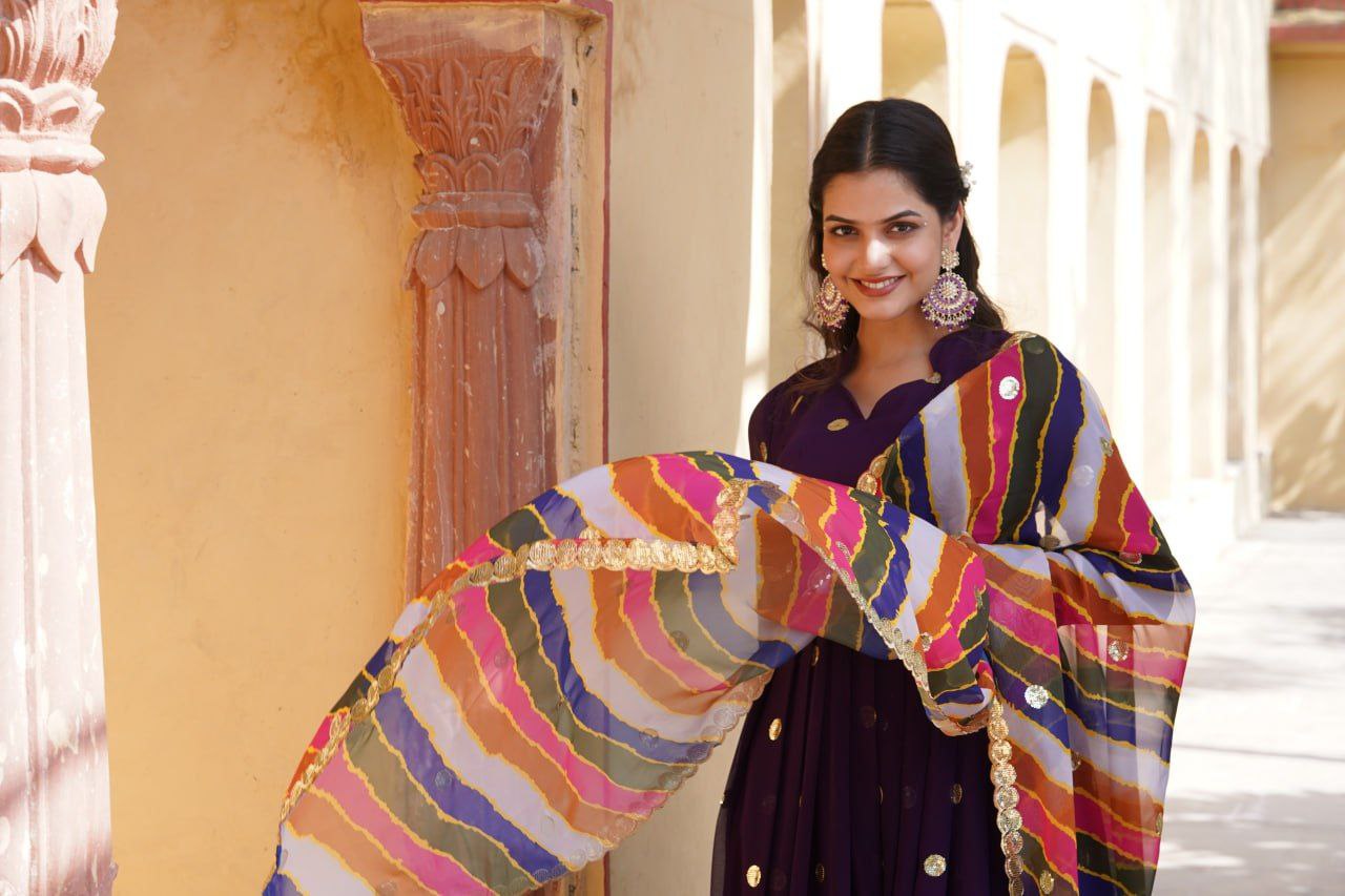 Dhumavati purple georgette anarkali gown suit set
