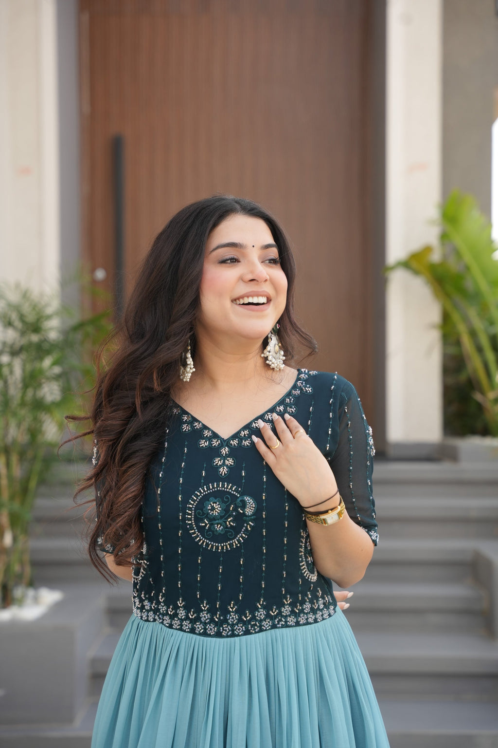 Hemrika Rama Color Embroidered Gown – designer rama green ethnic gown for women with floral digital print and beads embroidery, premium faux blooming floor-length gown, half sleeve Anarkali gown with round neckline, canvas patta stitching for extra flair, elegant Indian partywear and festive gown, fully lined with cotton for comfort, Trinaari ready to wear ethnic gown.