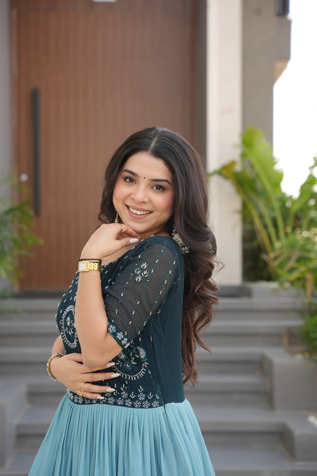 Hemrika Rama Color Embroidered Gown – designer rama green ethnic gown for women with floral digital print and beads embroidery, premium faux blooming floor-length gown, half sleeve Anarkali gown with round neckline, canvas patta stitching for extra flair, elegant Indian partywear and festive gown, fully lined with cotton for comfort, Trinaari ready to wear ethnic gown.