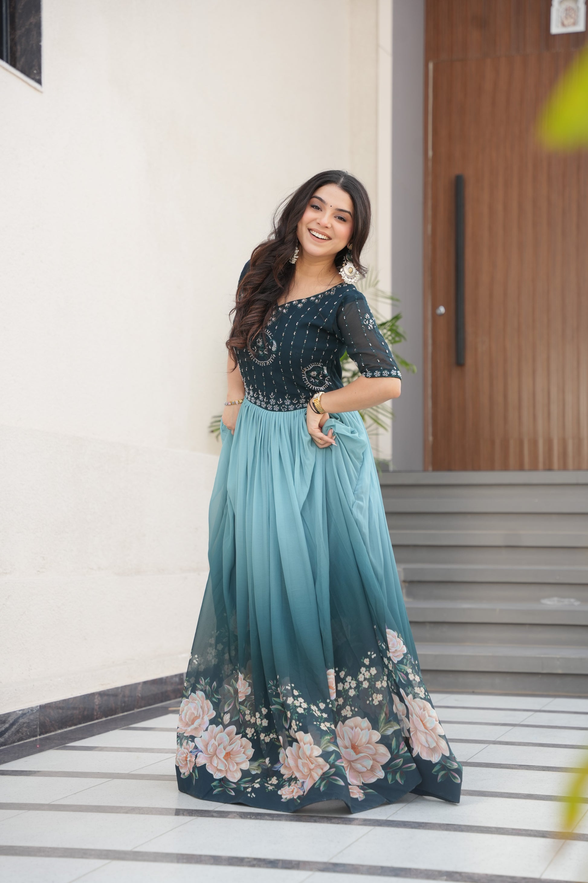 Hemrika Rama Color Embroidered Gown – designer rama green ethnic gown for women with floral digital print and beads embroidery, premium faux blooming floor-length gown, half sleeve Anarkali gown with round neckline, canvas patta stitching for extra flair, elegant Indian partywear and festive gown, fully lined with cotton for comfort, Trinaari ready to wear ethnic gown.