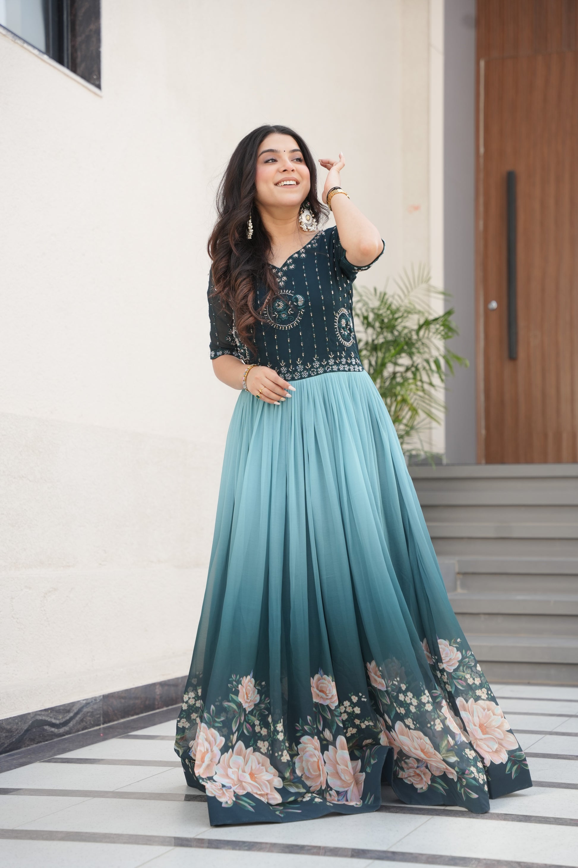 Hemrika Rama Color Embroidered Gown – designer rama green ethnic gown for women with floral digital print and beads embroidery, premium faux blooming floor-length gown, half sleeve Anarkali gown with round neckline, canvas patta stitching for extra flair, elegant Indian partywear and festive gown, fully lined with cotton for comfort, Trinaari ready to wear ethnic gown.
