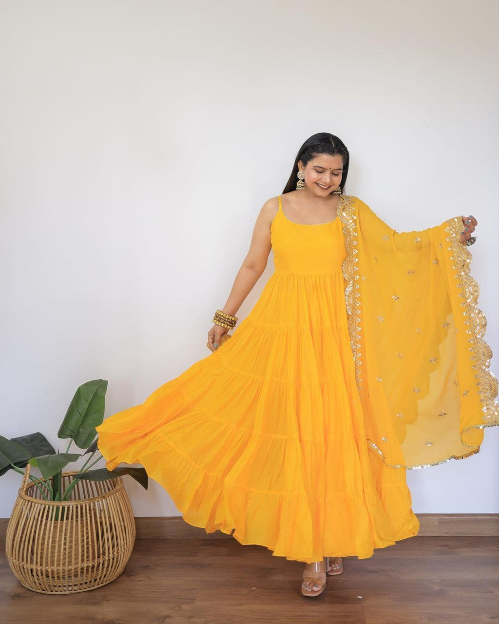 Devayani yellow georgette anarkali gown set