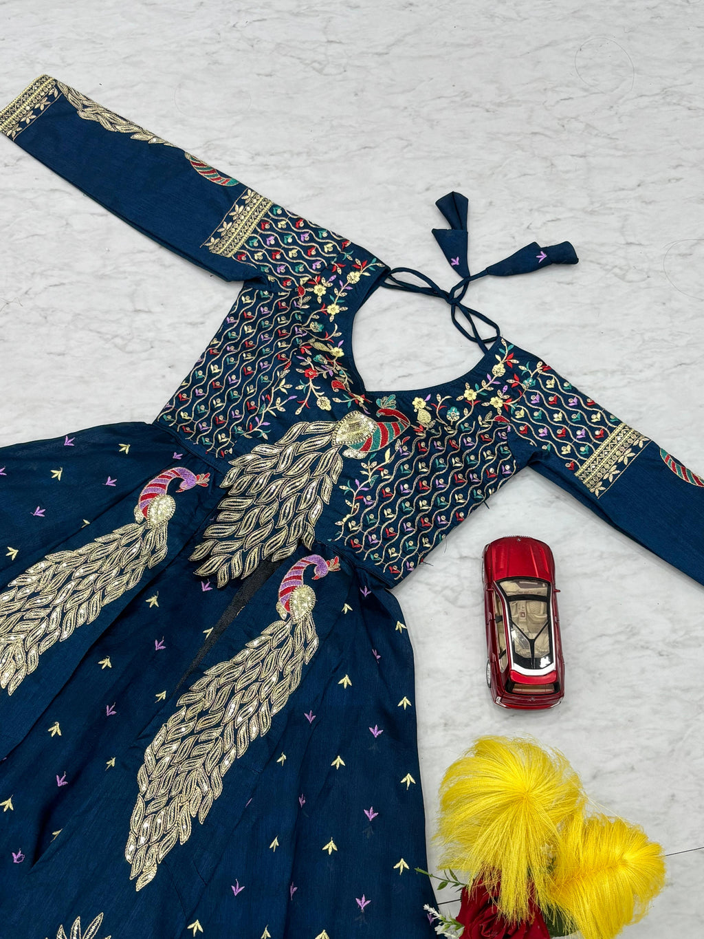 Mani Teal Blue Vichitra Silk Crop Top Peacock Design Lehenga with Embroidered Shrug