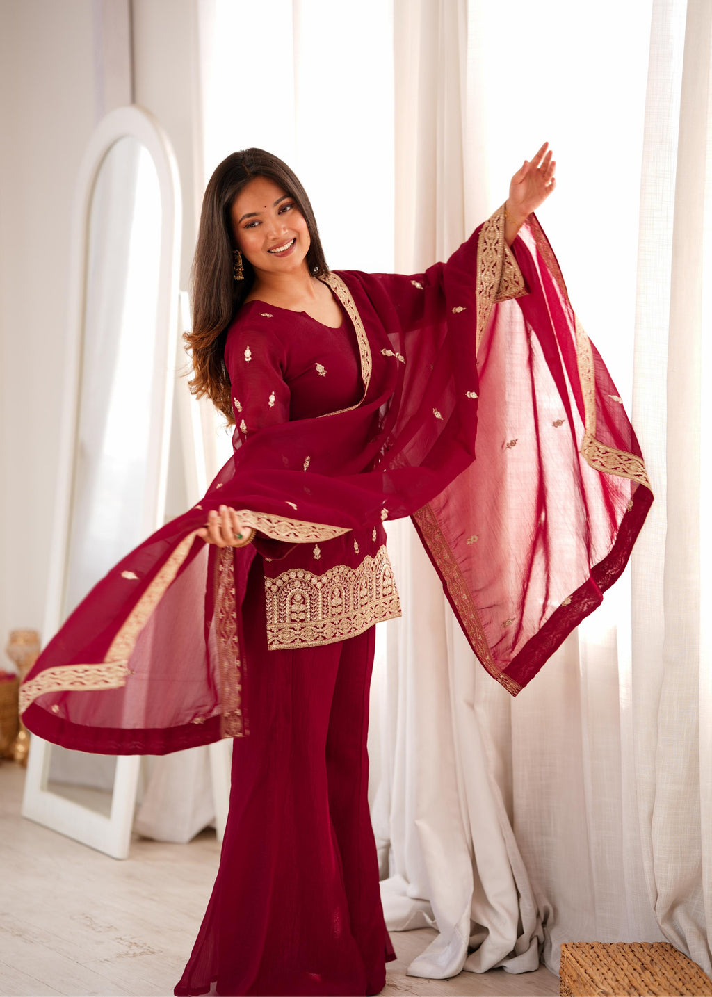 Royal Burgundy Embroidered Palazzo Suit with Intricate Golden Zari Work, Statement Cuffs & Matching Border Dupatta
