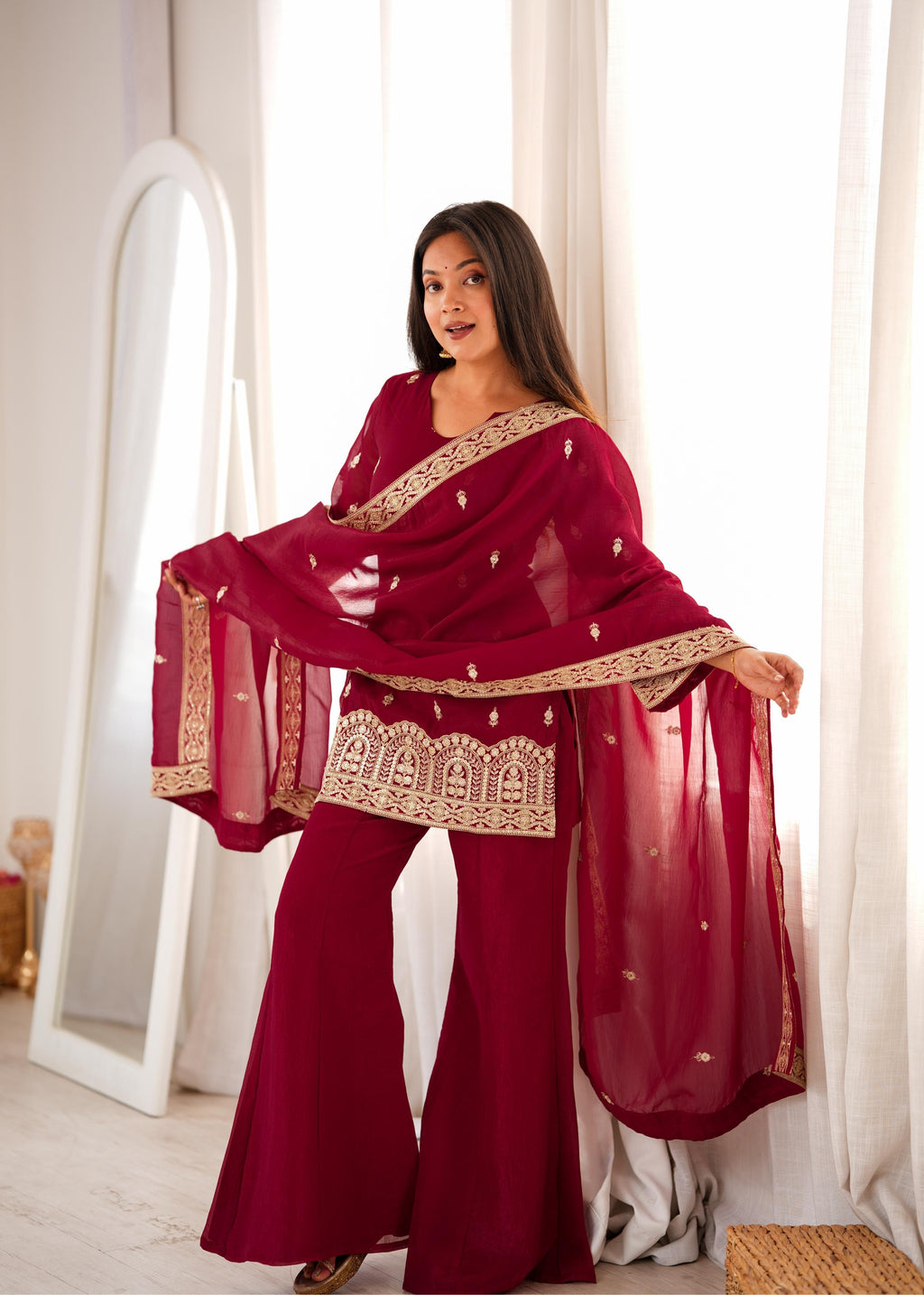 Royal Burgundy Embroidered Palazzo Suit with Intricate Golden Zari Work, Statement Cuffs & Matching Border Dupatta